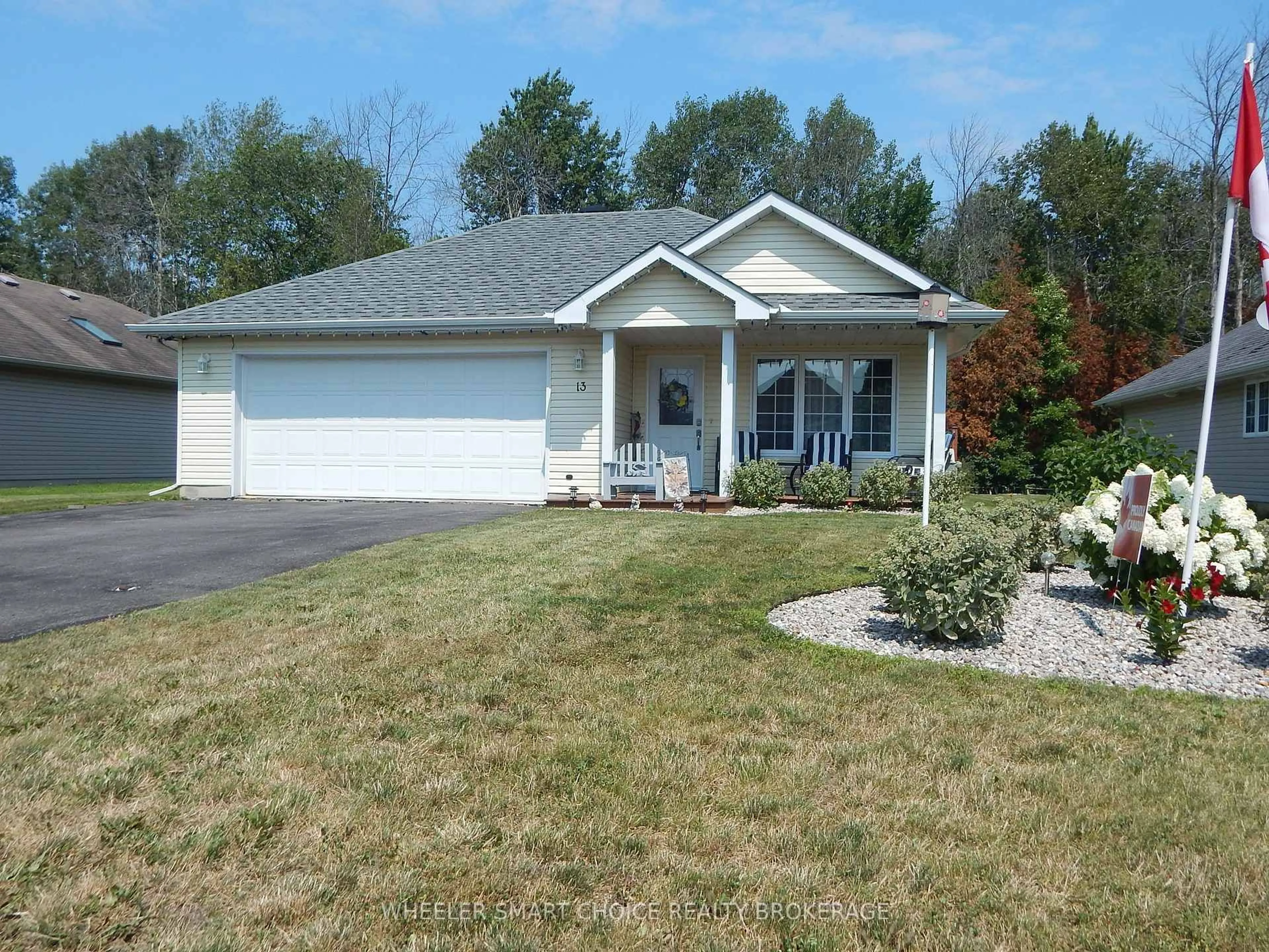 Home with vinyl exterior material, street for 13 Cypress Lane, South Stormont Ontario K0C 1M0