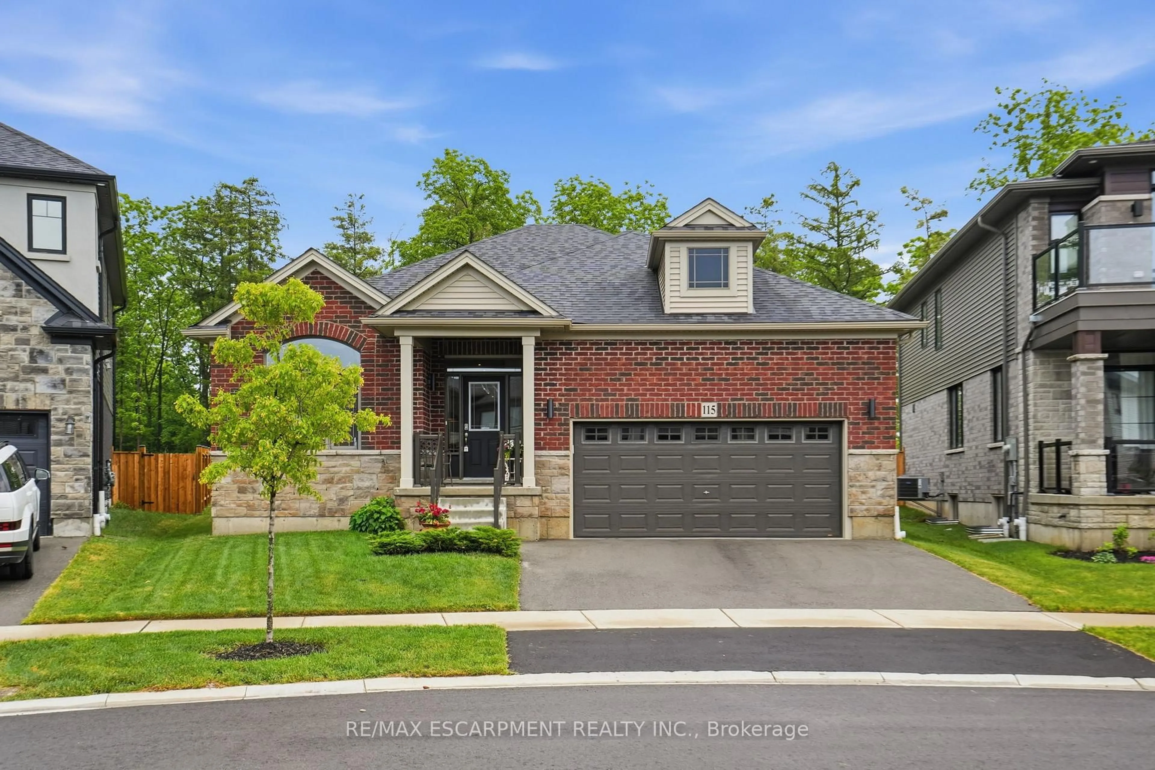 Home with brick exterior material, street for 115 Daugaard Ave, Brant Ontario N3L 0L6