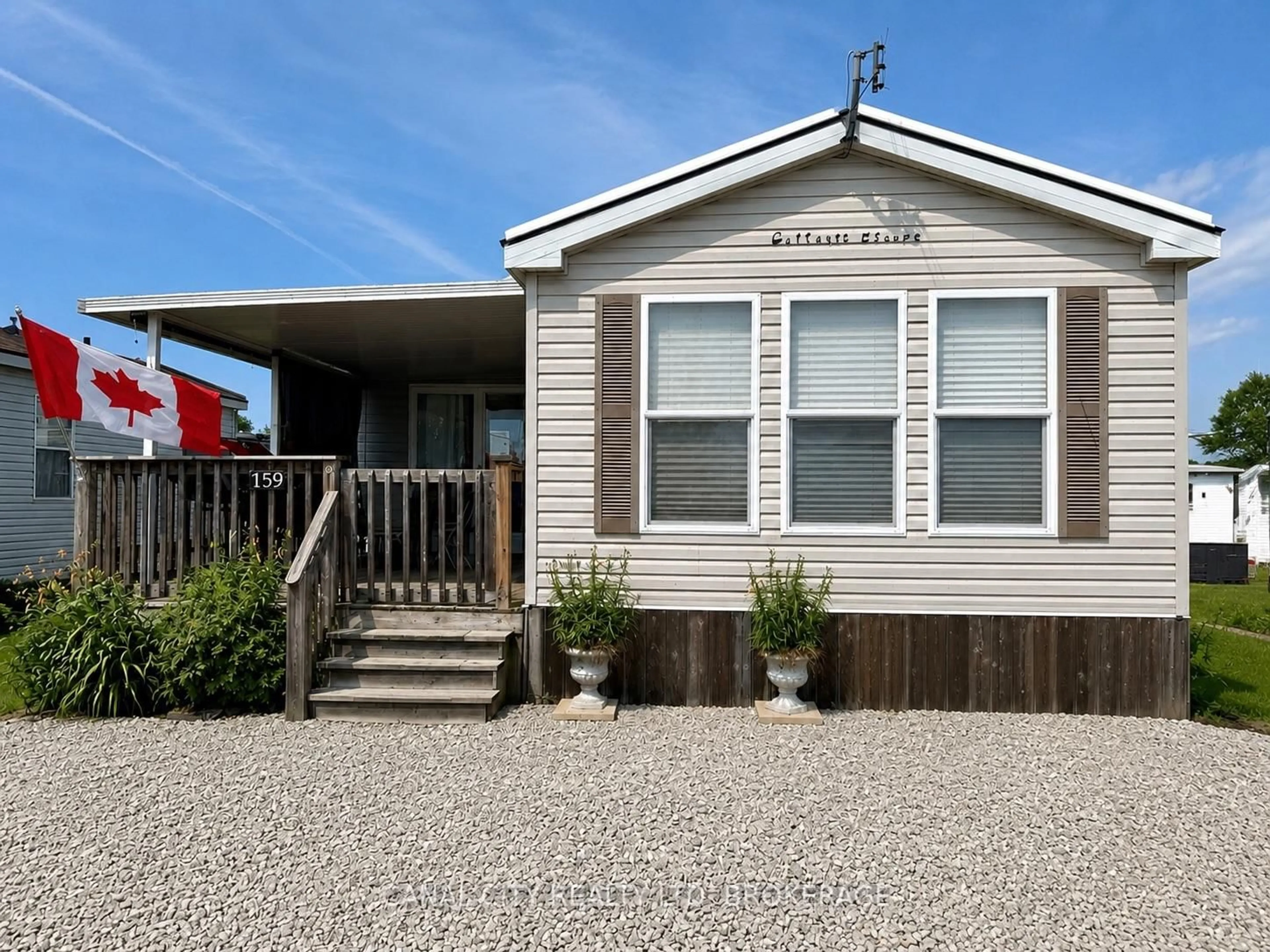 Home with vinyl exterior material, street for 659 PORT MAITLAND Rd #159, Haldimand Ontario N1A 2W6