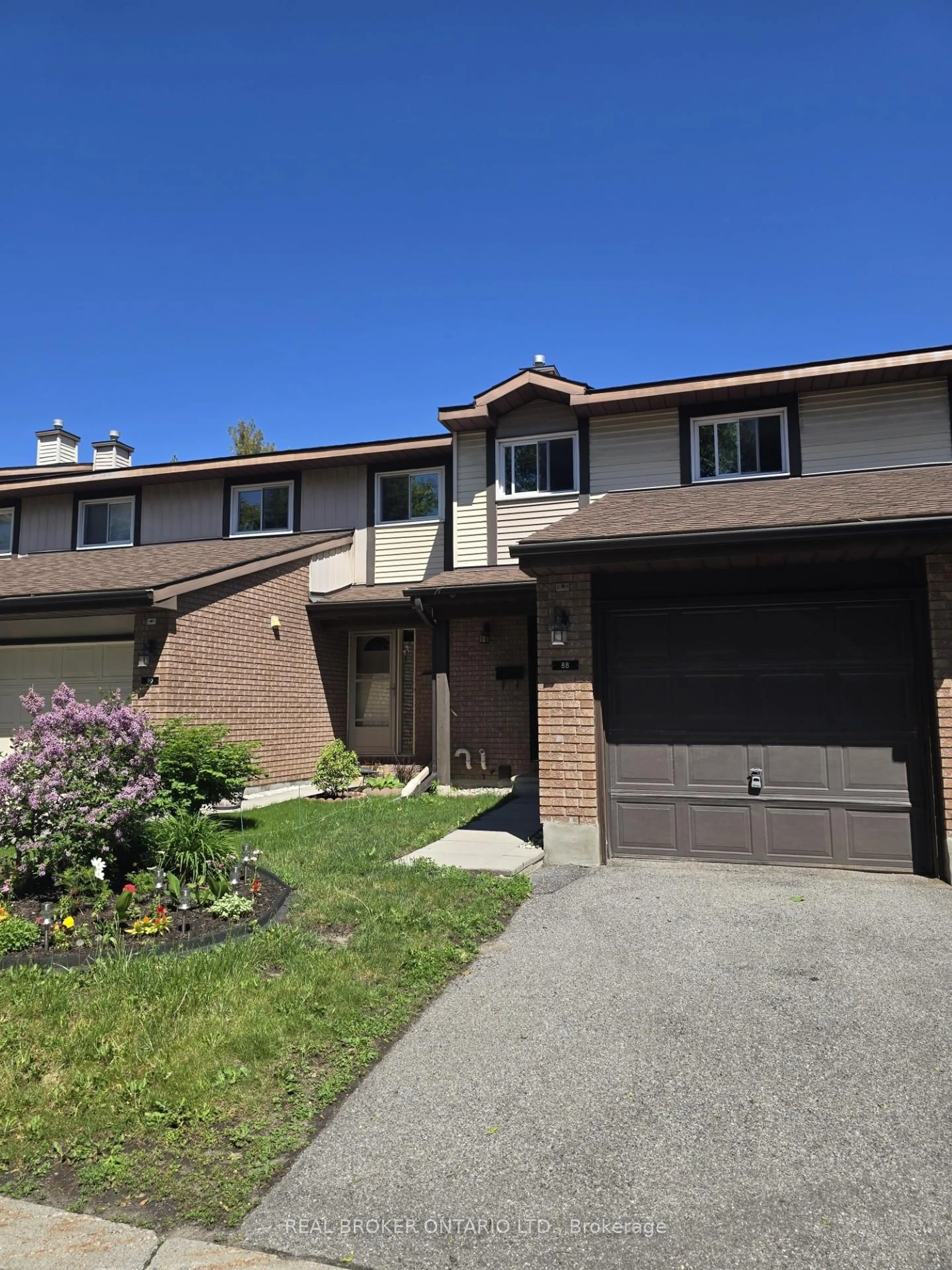 Home with brick exterior material, street for 88 Clarkson Cres #65, Ottawa Ontario K2L 3E2