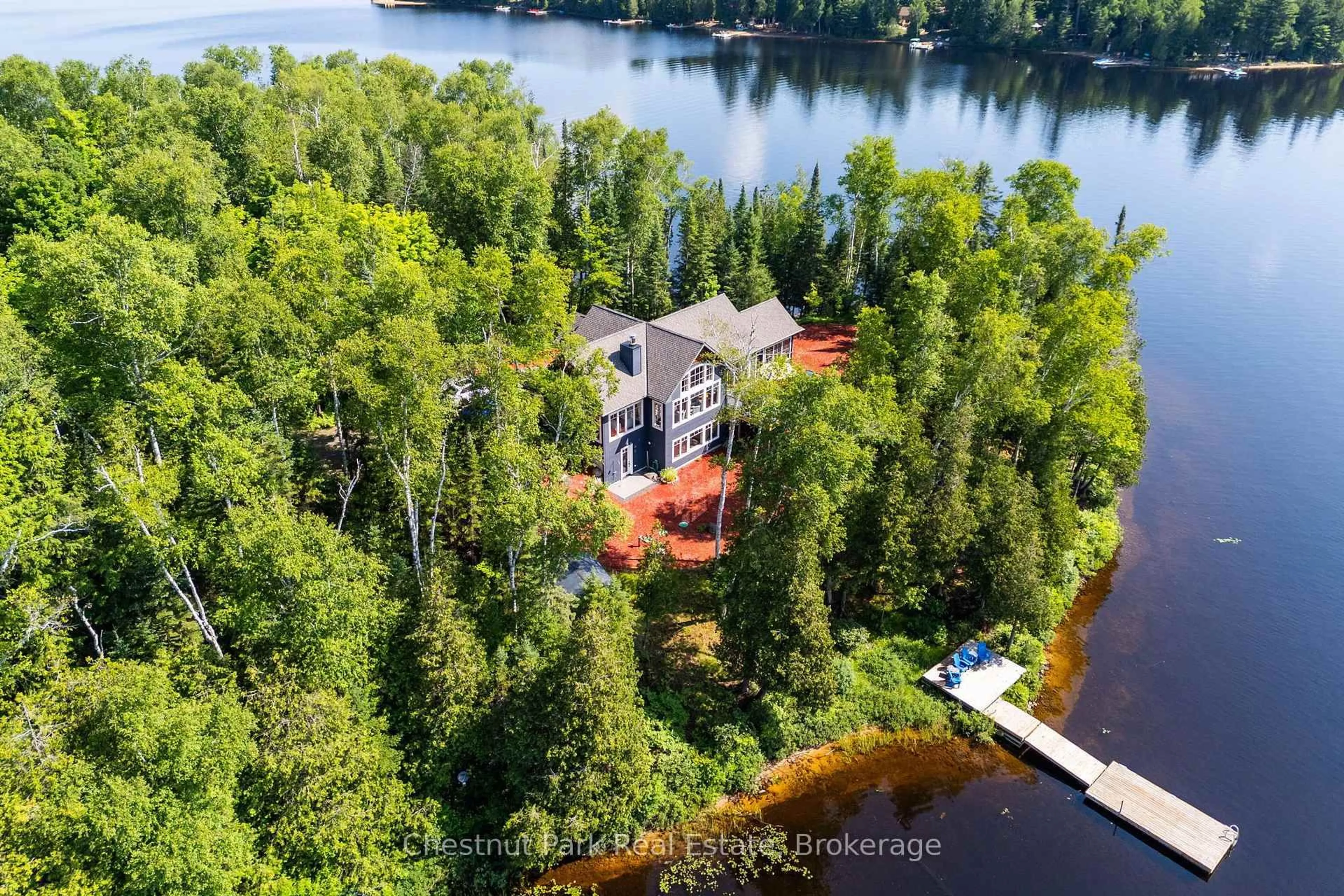 A pic from outside/outdoor area/front of a property/back of a property/a pic from drone, water/lake/river/ocean view for 1136 Severn Lane, Algonquin Highlands Ontario P0A 1E0