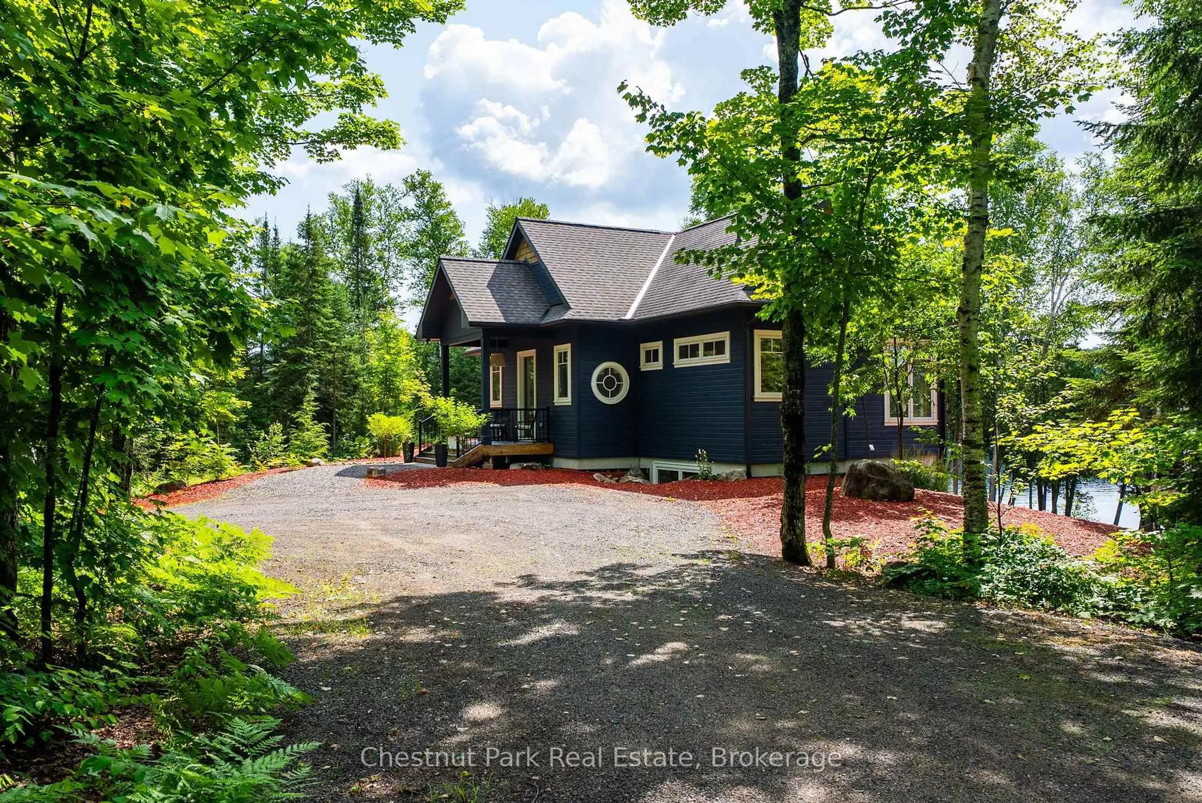 A pic from outside/outdoor area/front of a property/back of a property/a pic from drone, unknown for 1136 Severn Lane, Algonquin Highlands Ontario P0A 1E0