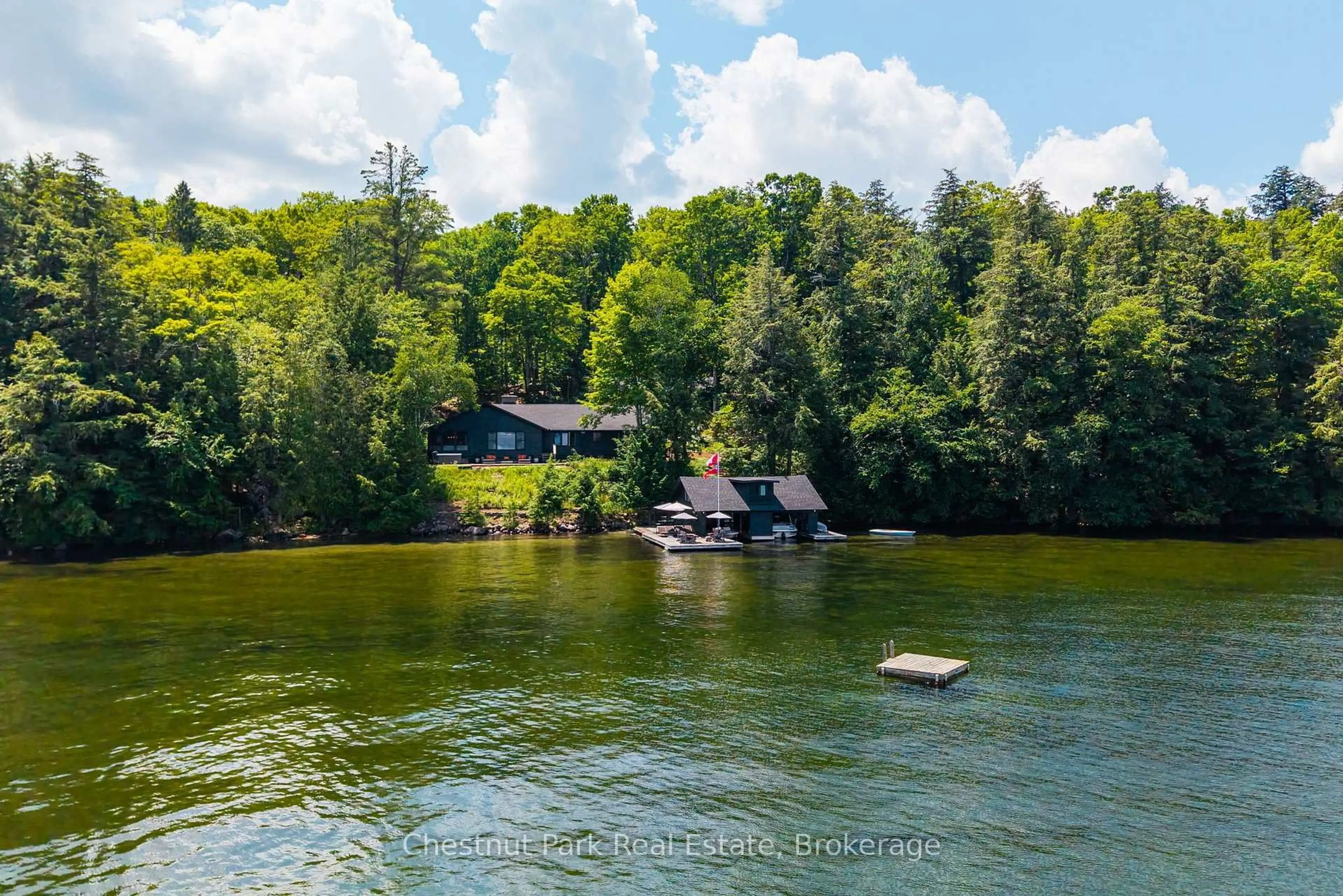 A pic from outside/outdoor area/front of a property/back of a property/a pic from drone, water/lake/river/ocean view for 4916 Muskoka Rd 169 Rd #7, Muskoka Lakes Ontario P0C 1H0