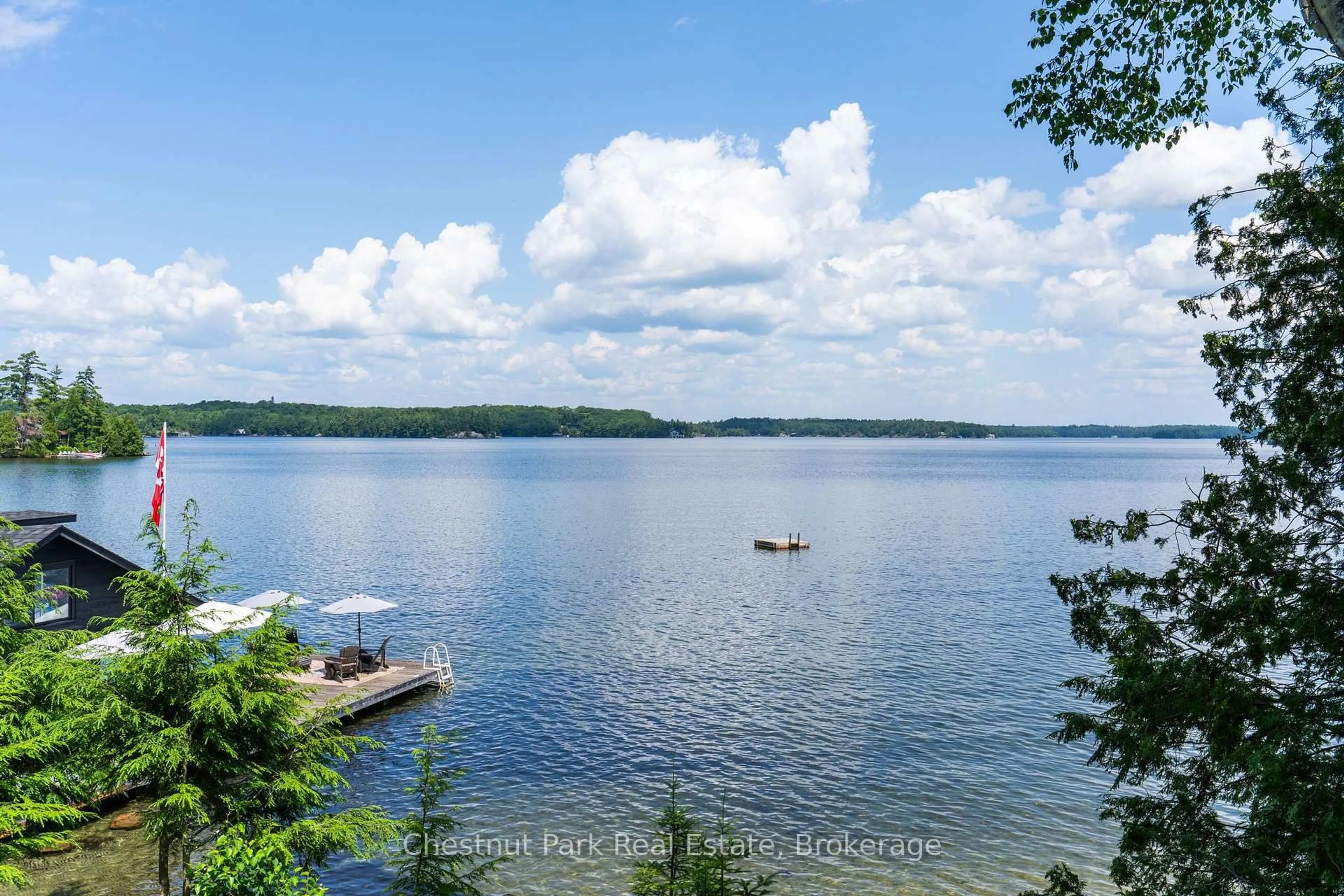 A pic from outside/outdoor area/front of a property/back of a property/a pic from drone, water/lake/river/ocean view for 4916 Muskoka Rd 169 Rd #7, Muskoka Lakes Ontario P0C 1H0
