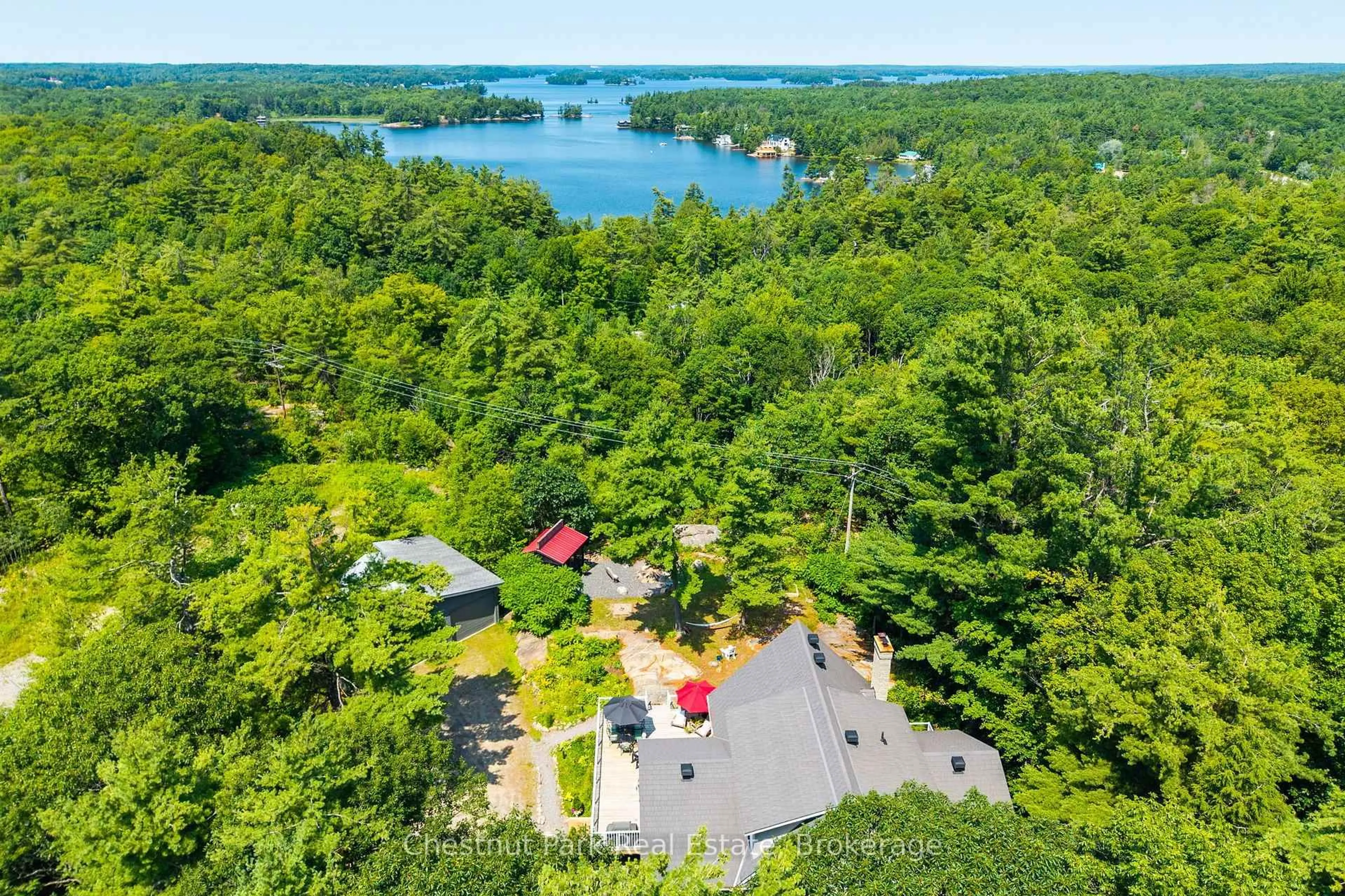 A pic from outside/outdoor area/front of a property/back of a property/a pic from drone, water/lake/river/ocean view for 2488 Falkenburg Rd, Muskoka Lakes Ontario P0B 1J0