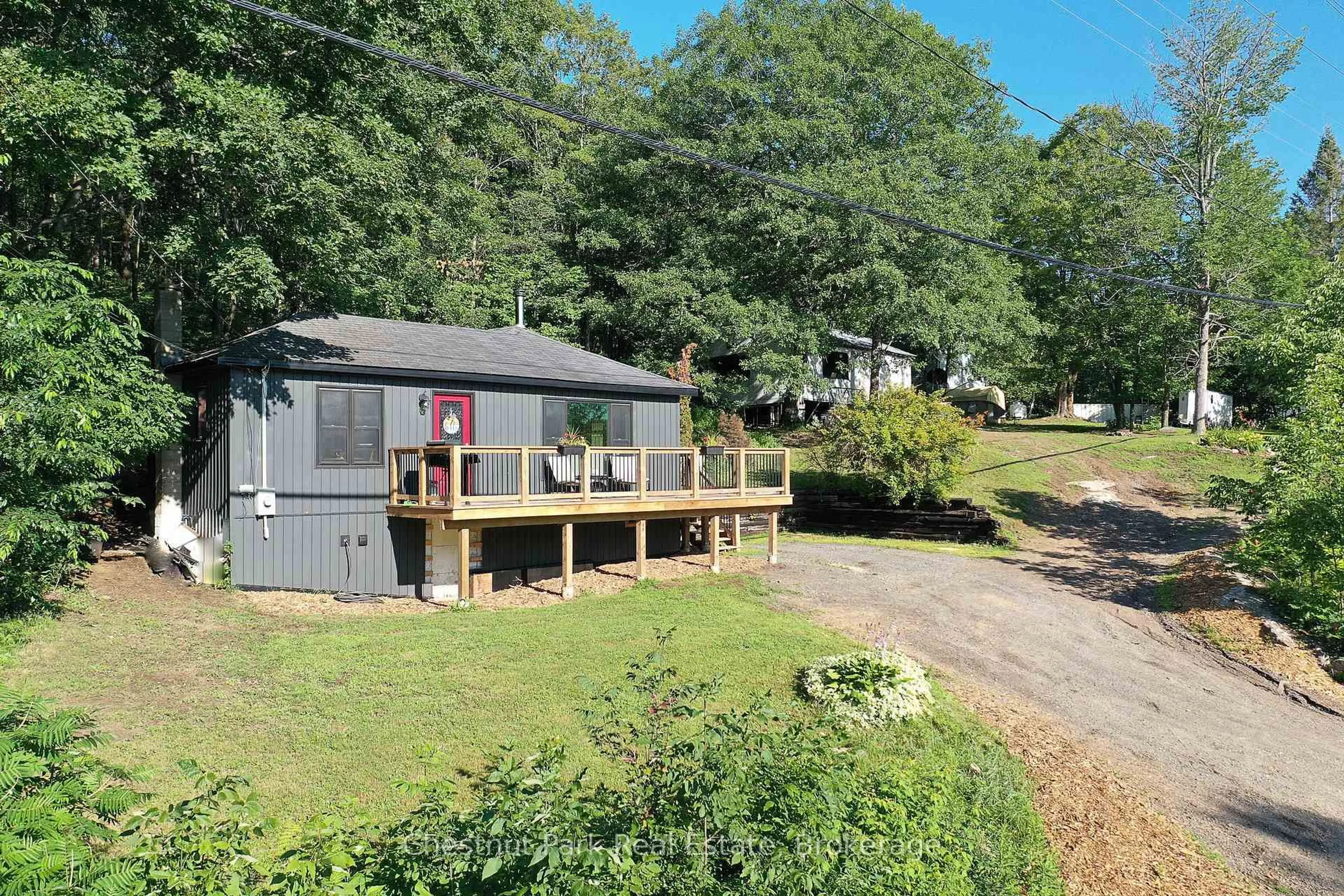 A pic from outside/outdoor area/front of a property/back of a property/a pic from drone, unknown for 17565 Highway 35 Highway, Algonquin Highlands Ontario K0M 1S0