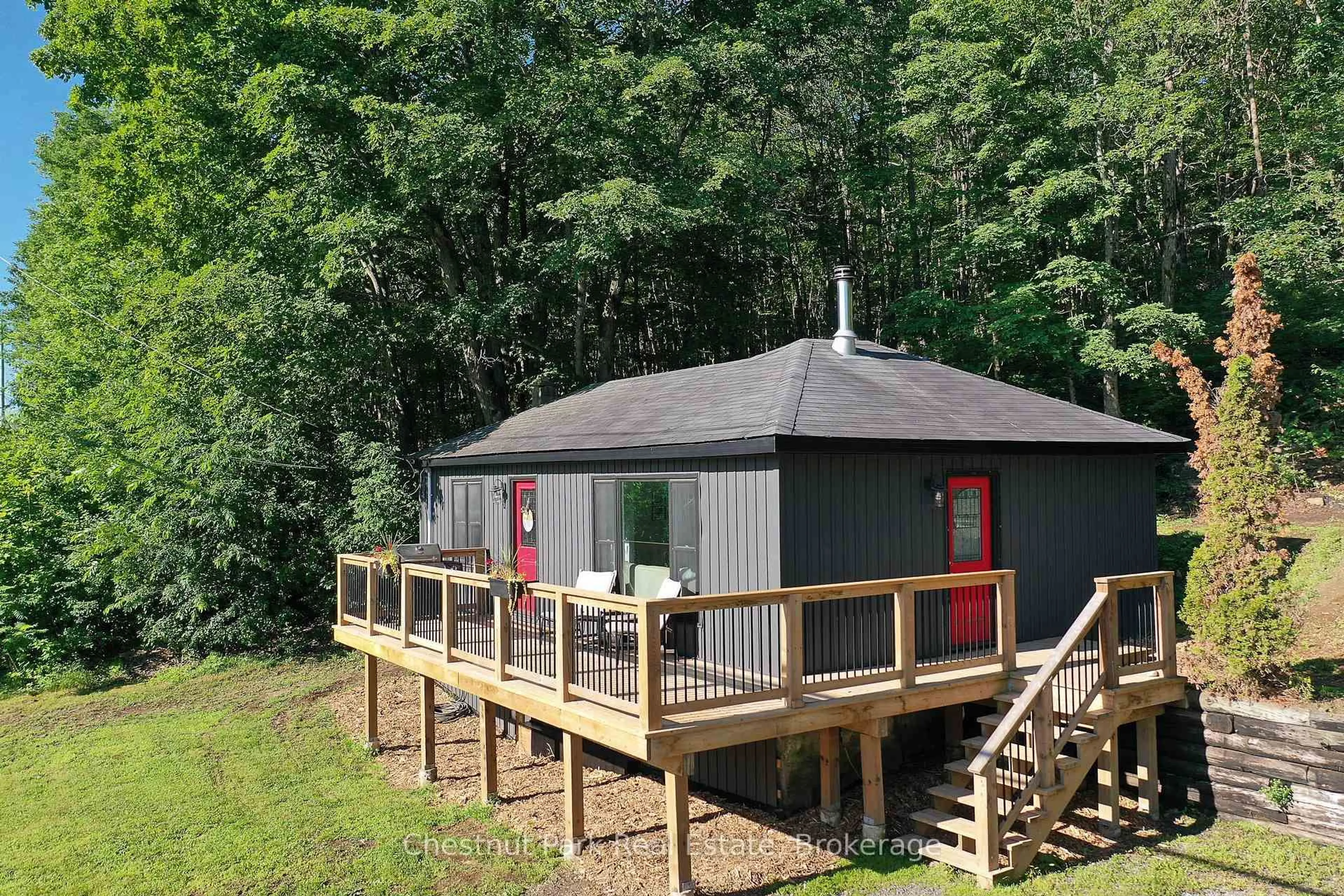 A pic from outside/outdoor area/front of a property/back of a property/a pic from drone, unknown for 17565 Highway 35 Highway, Algonquin Highlands Ontario K0M 1S0