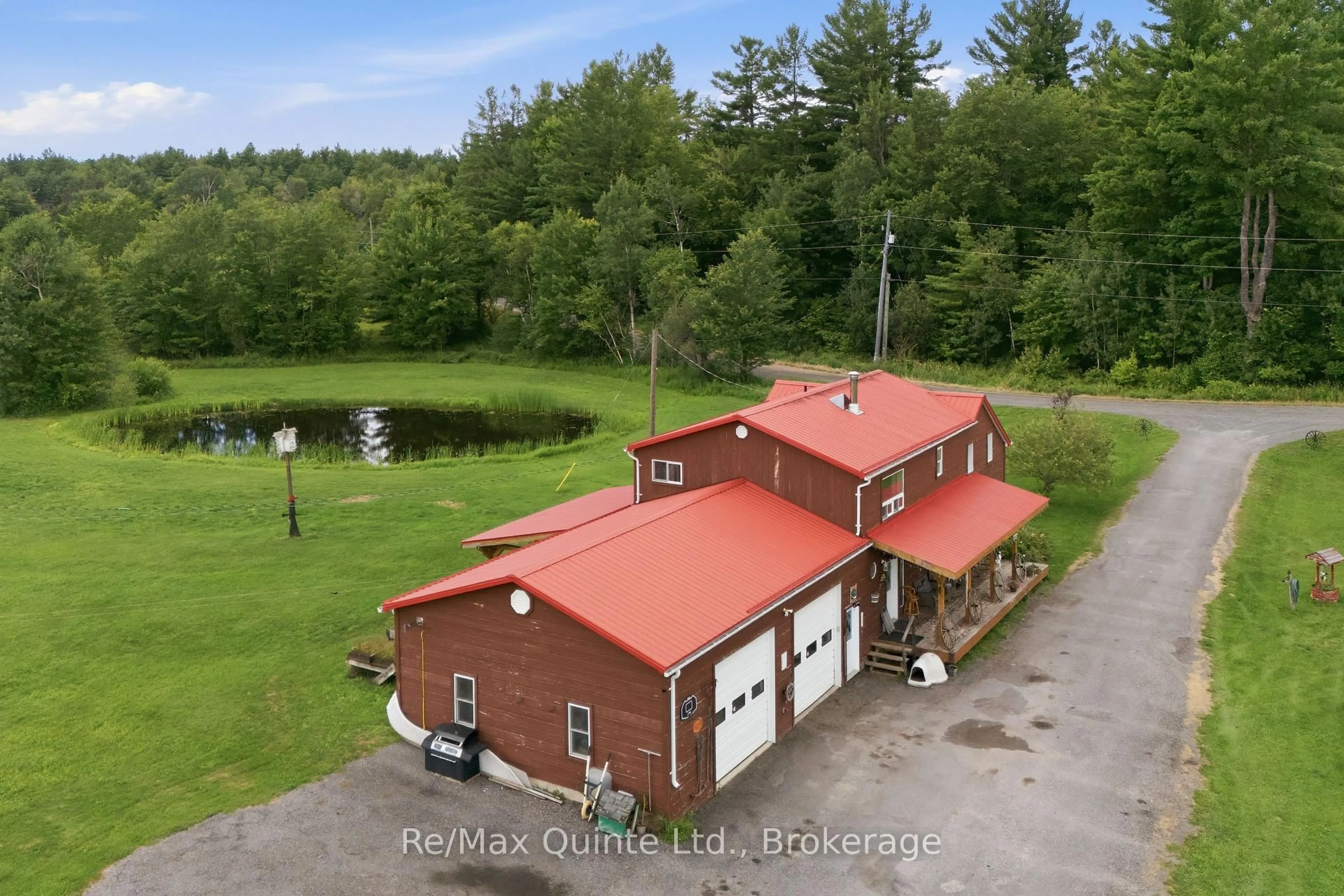 A pic from outside/outdoor area/front of a property/back of a property/a pic from drone, water/lake/river/ocean view for 95 Moores Rd, Tweed Ontario K0K 3J0