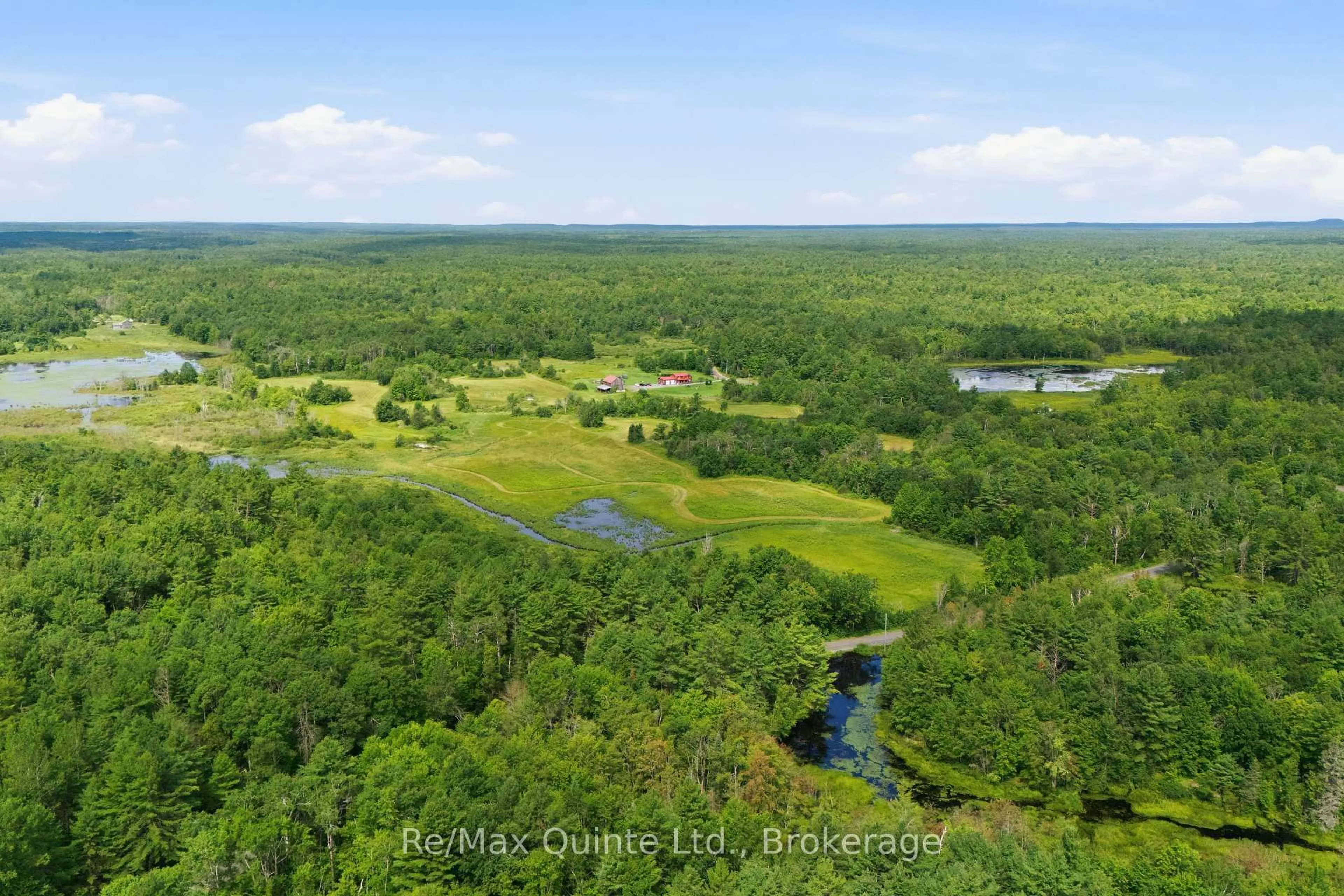 A pic from outside/outdoor area/front of a property/back of a property/a pic from drone, water/lake/river/ocean view for 95 Moores Rd, Tweed Ontario K0K 3J0