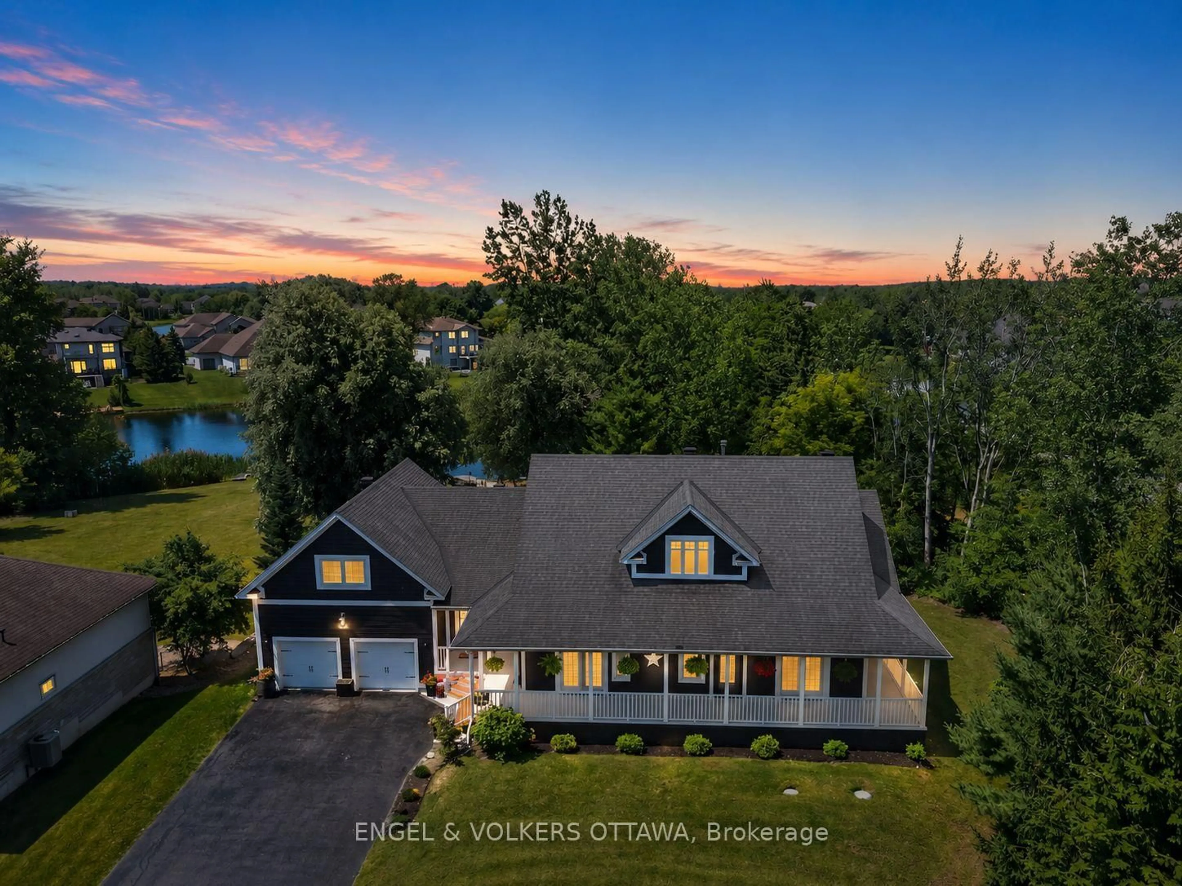 A pic from outside/outdoor area/front of a property/back of a property/a pic from drone, water/lake/river/ocean view for 6881 Sparkling Lake Way, Greely Ontario K4P 1R7