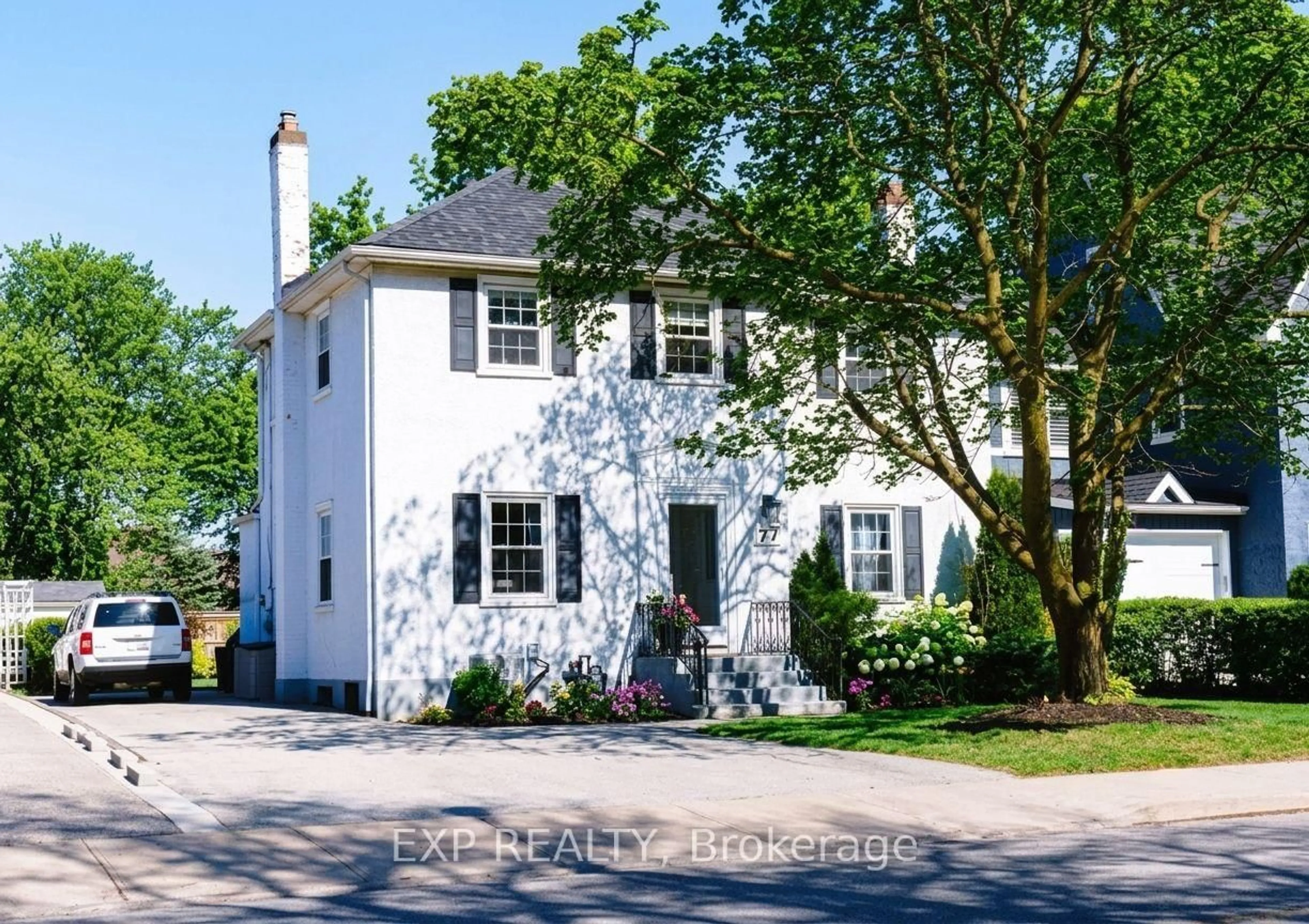 Home with vinyl exterior material, street for 77 Glenridge Ave, St. Catharines Ontario L2R 4X2