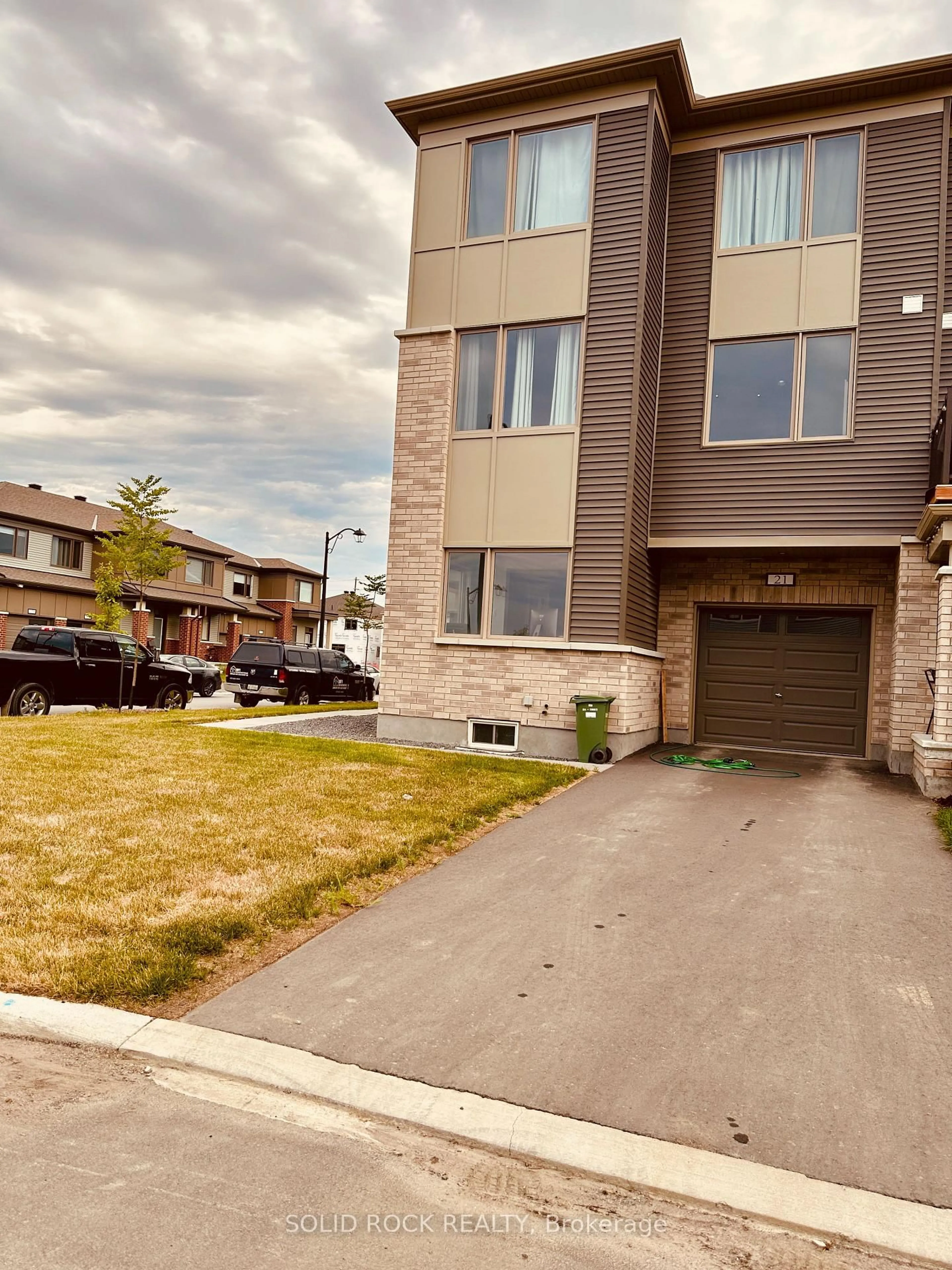 A pic from outside/outdoor area/front of a property/back of a property/a pic from drone, street for 21 Stitch Mews St, Richmond Ontario K0A 2Z0