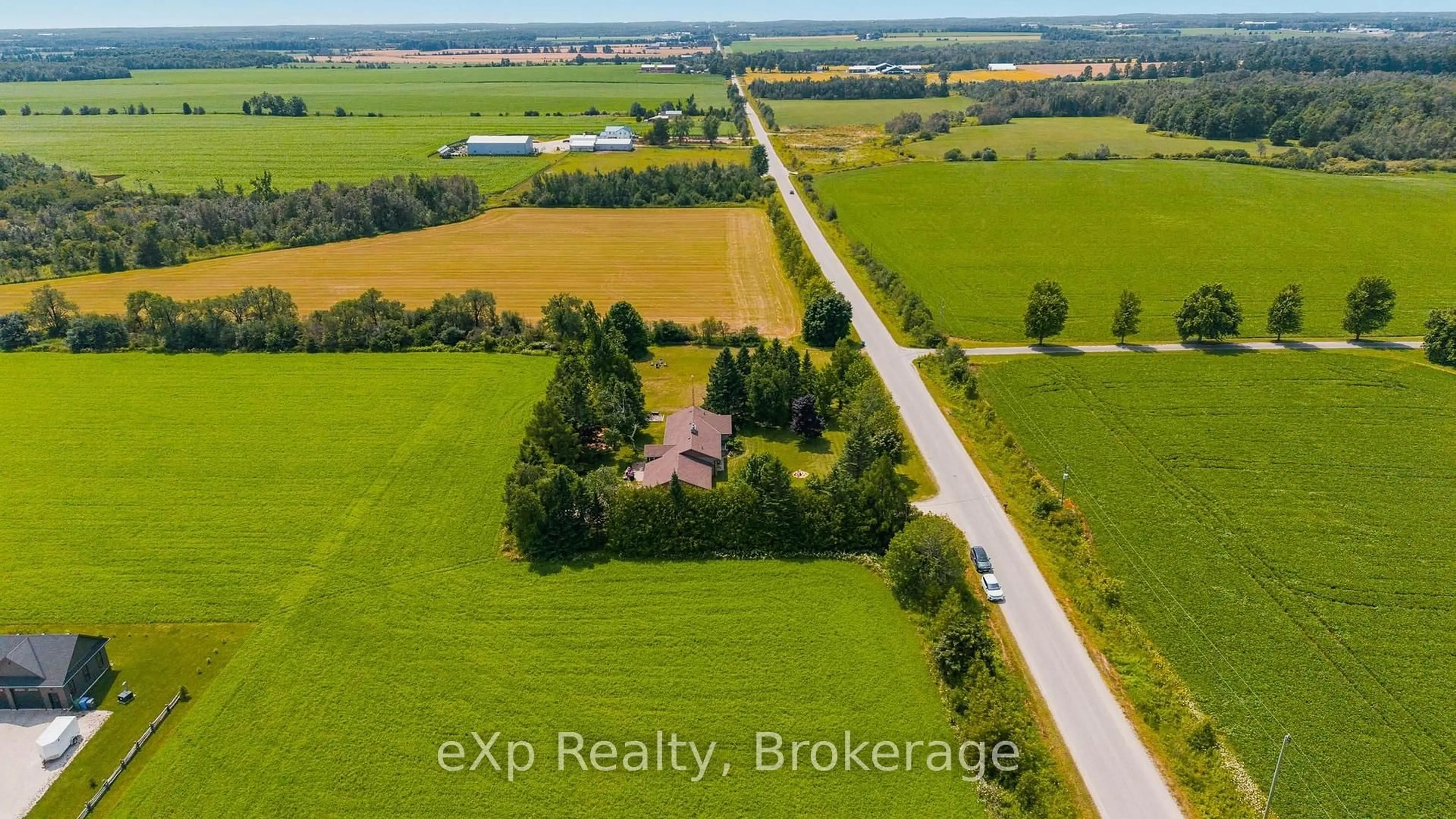 A pic from outside/outdoor area/front of a property/back of a property/a pic from drone, street for 146534 Southgate 14 Rd, Southgate Ontario N0C 1B0