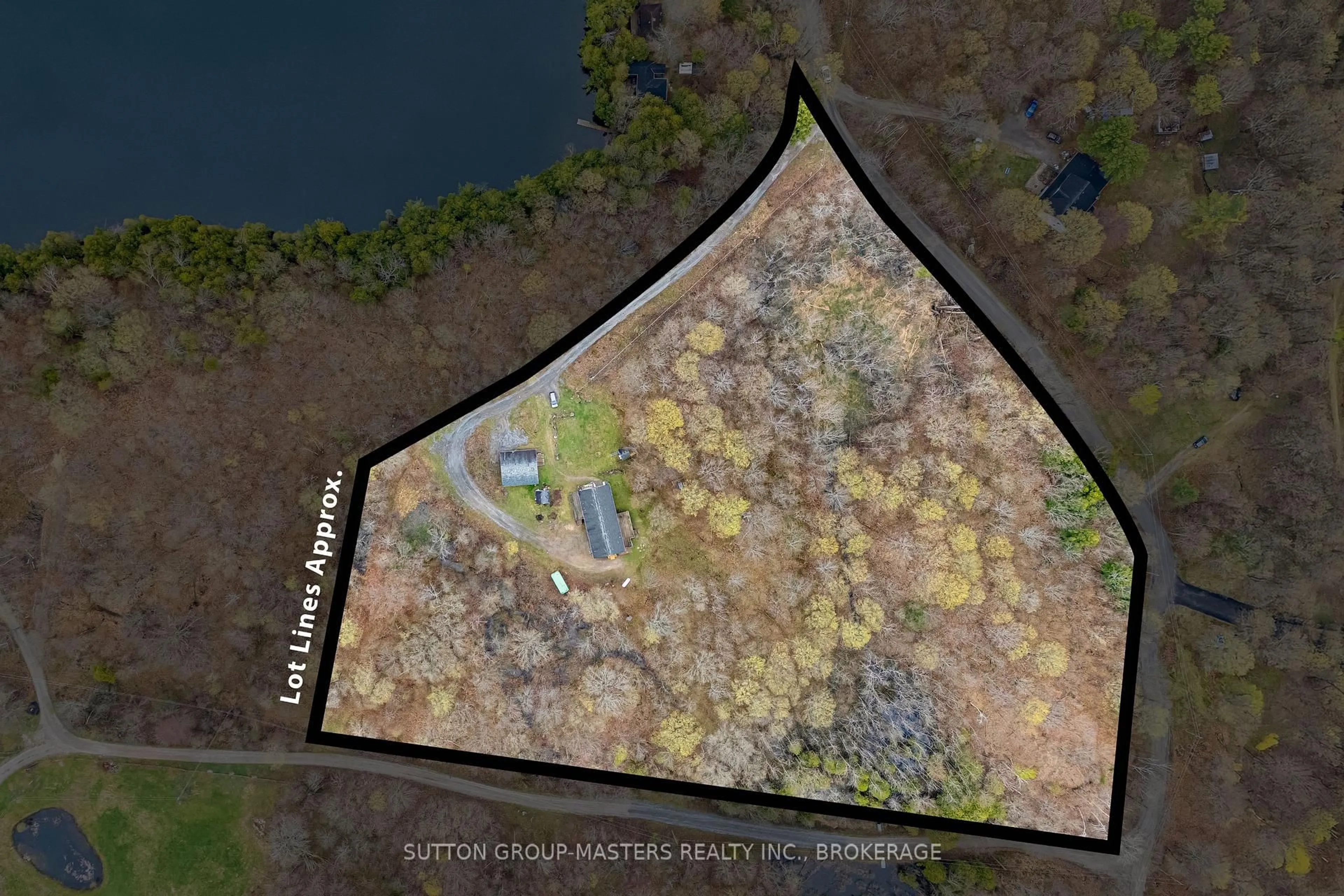 A pic from outside/outdoor area/front of a property/back of a property/a pic from drone, water/lake/river/ocean view for 1140 St. Georges Lake Rd, Maberly Ontario K0H 2B0