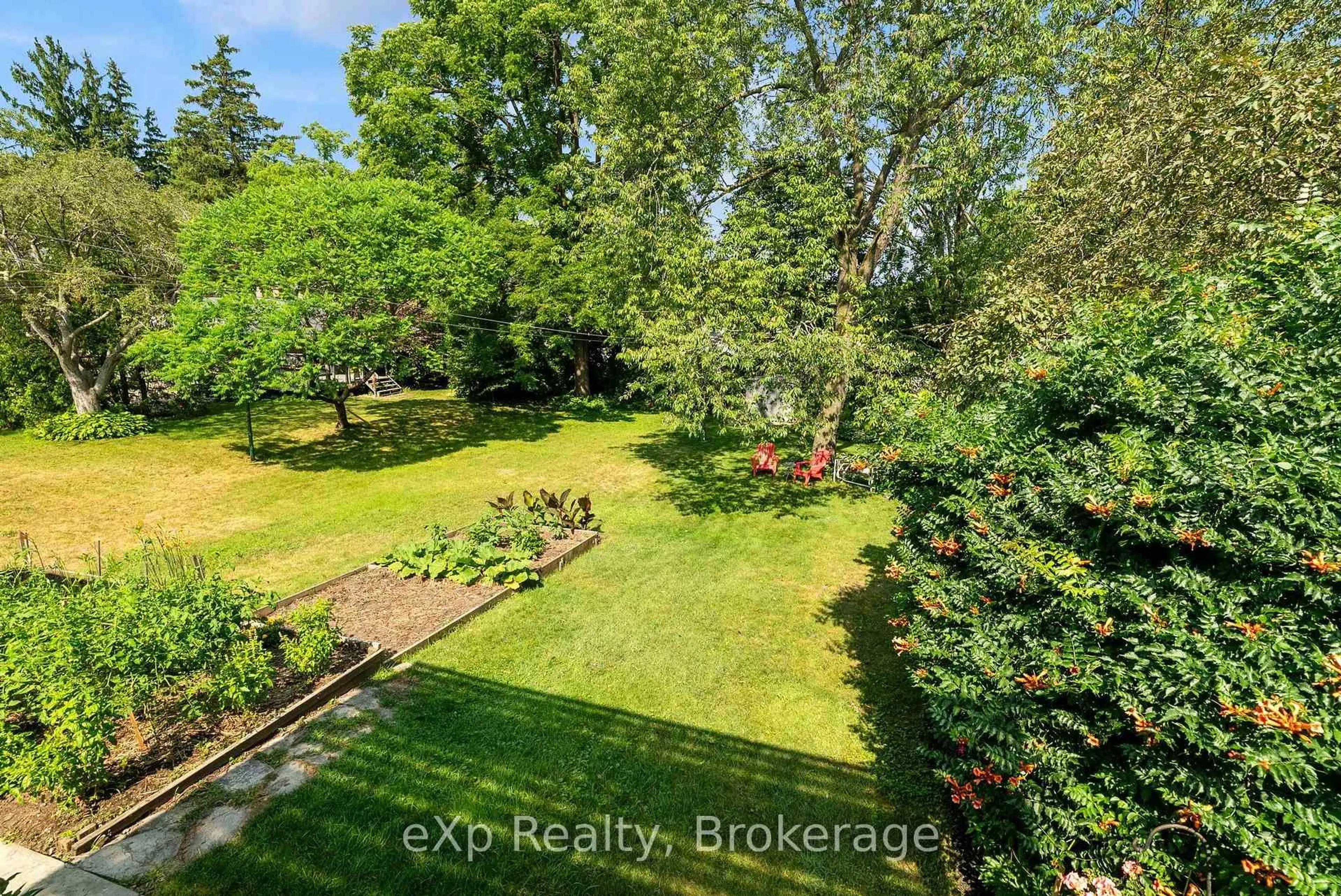 A pic from outside/outdoor area/front of a property/back of a property/a pic from drone, forest/trees view for 44 Birmingham St, Stratford Ontario N5A 2S6