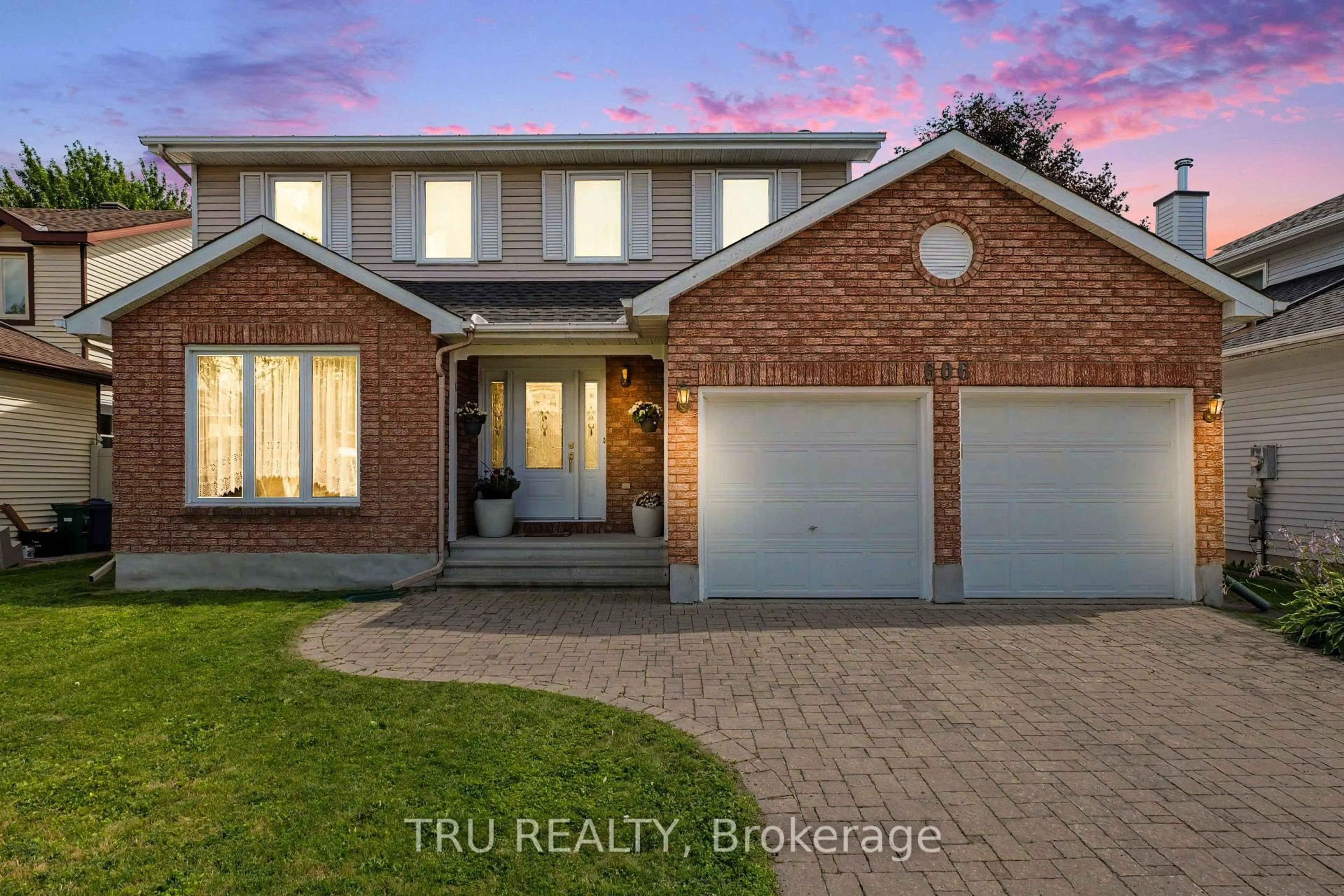 Home with brick exterior material, street for 606 Chenier Way, Ottawa Ontario K4A 1R1
