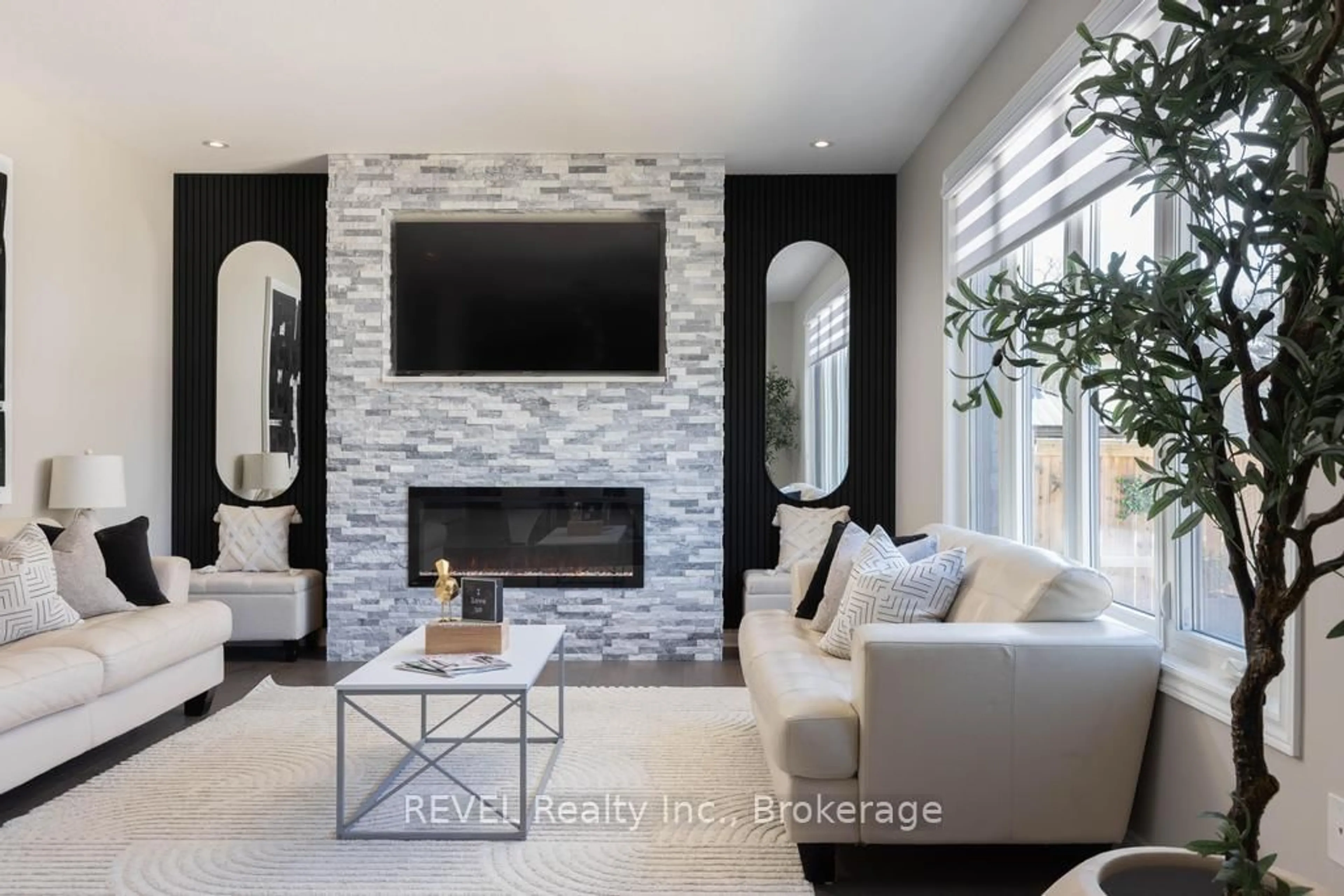 Living room with furniture, ceramic/tile floor for 7819 Pender St, Niagara Falls Ontario L2G 0H3