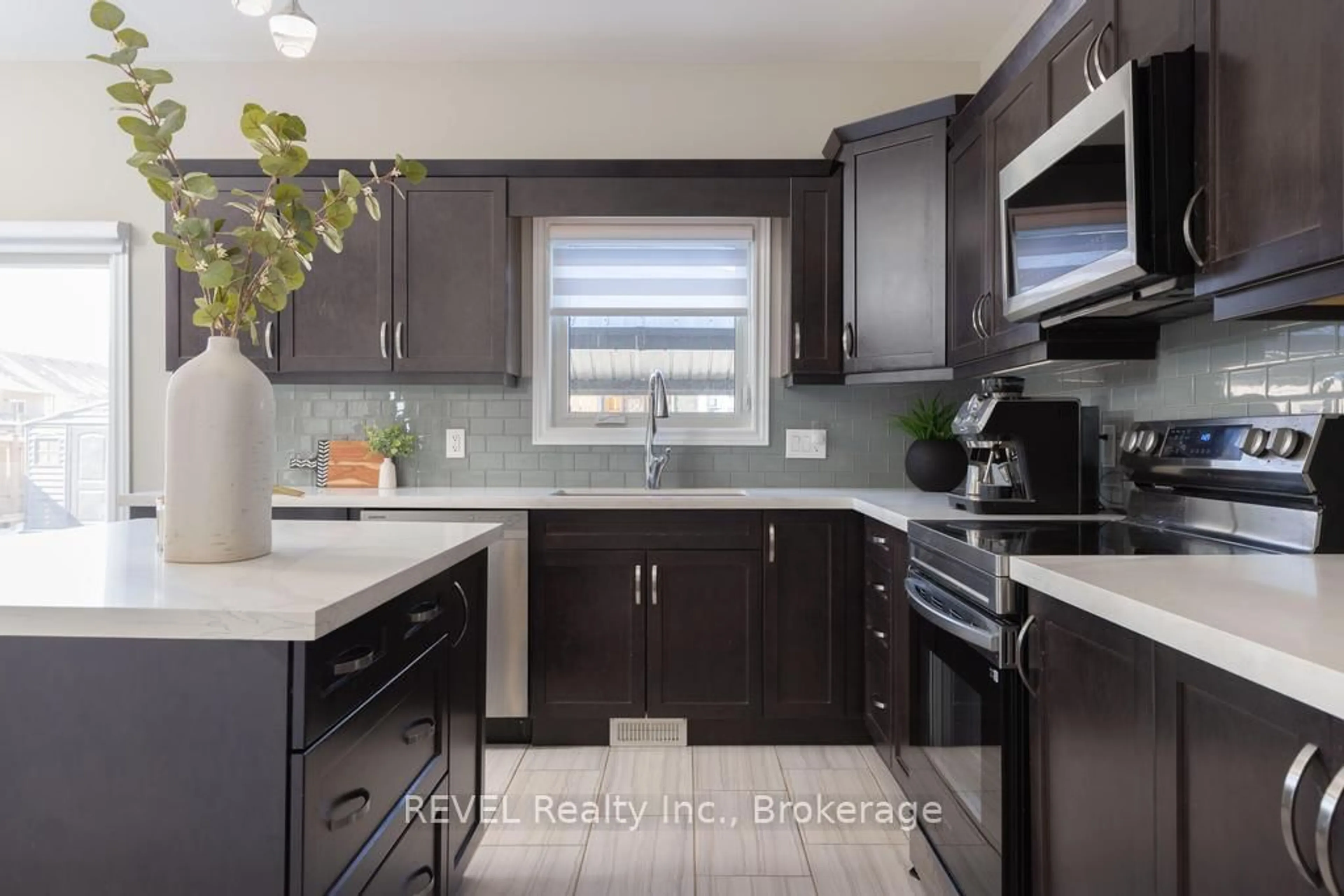 Open concept kitchen, ceramic/tile floor for 7819 Pender St, Niagara Falls Ontario L2G 0H3