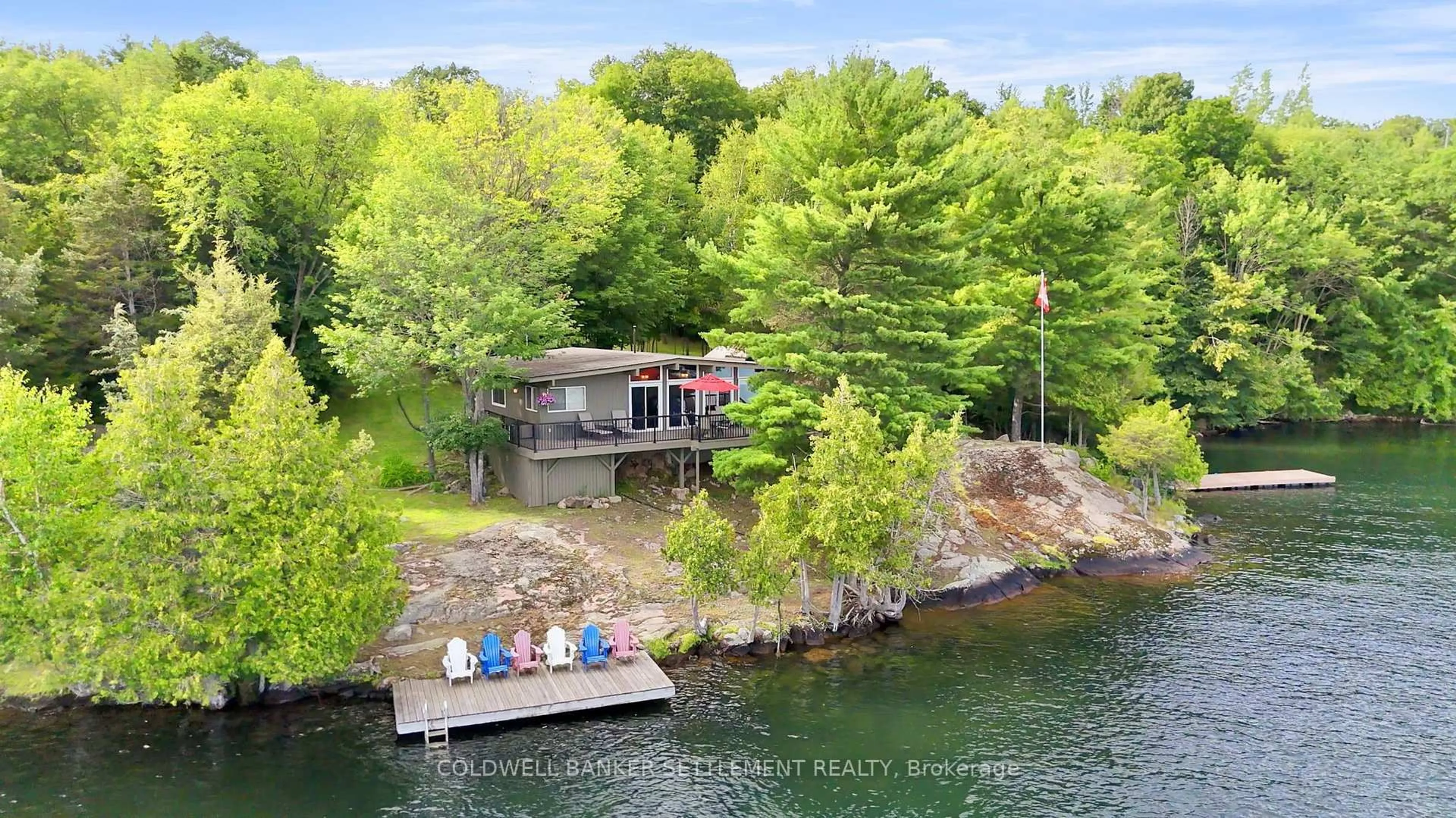 A pic from outside/outdoor area/front of a property/back of a property/a pic from drone, water/lake/river/ocean view for 100 Abby Hawk Lane, Perth Ontario K7H 3C5