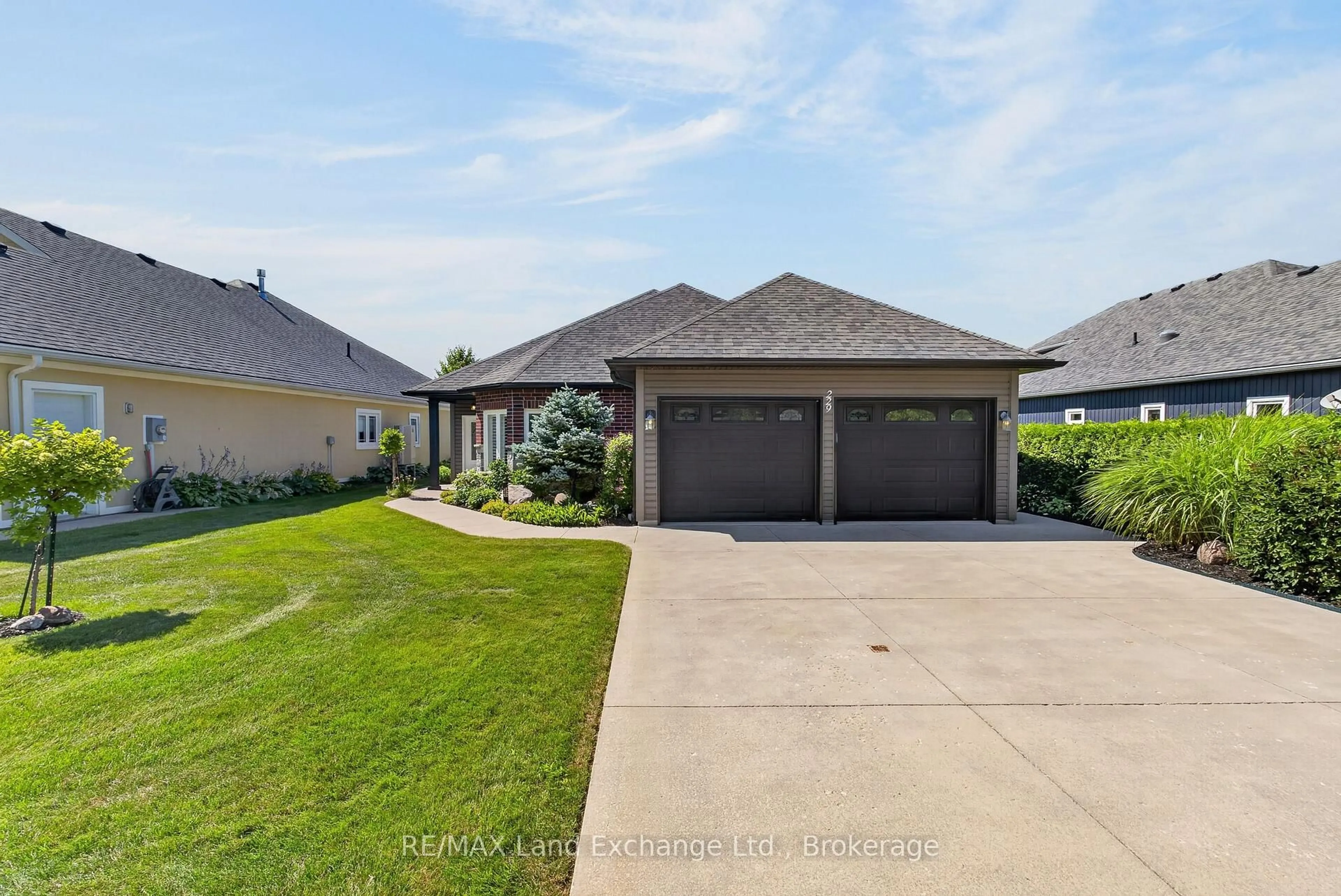 A pic from outside/outdoor area/front of a property/back of a property/a pic from drone, street for 229 Carloway Tr, Huron-Kinloss Ontario N2Z 0A4