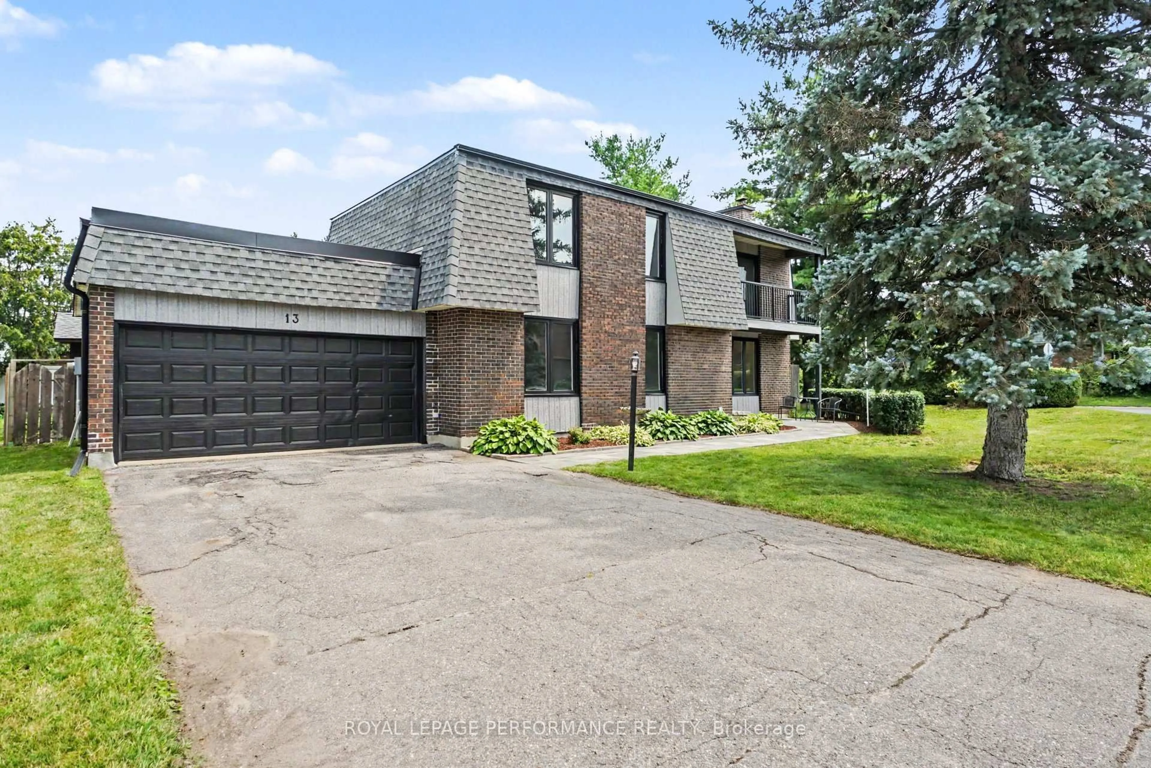 Home with brick exterior material, street for 13 Elvaston Ave, Ottawa Ontario K2G 3T2