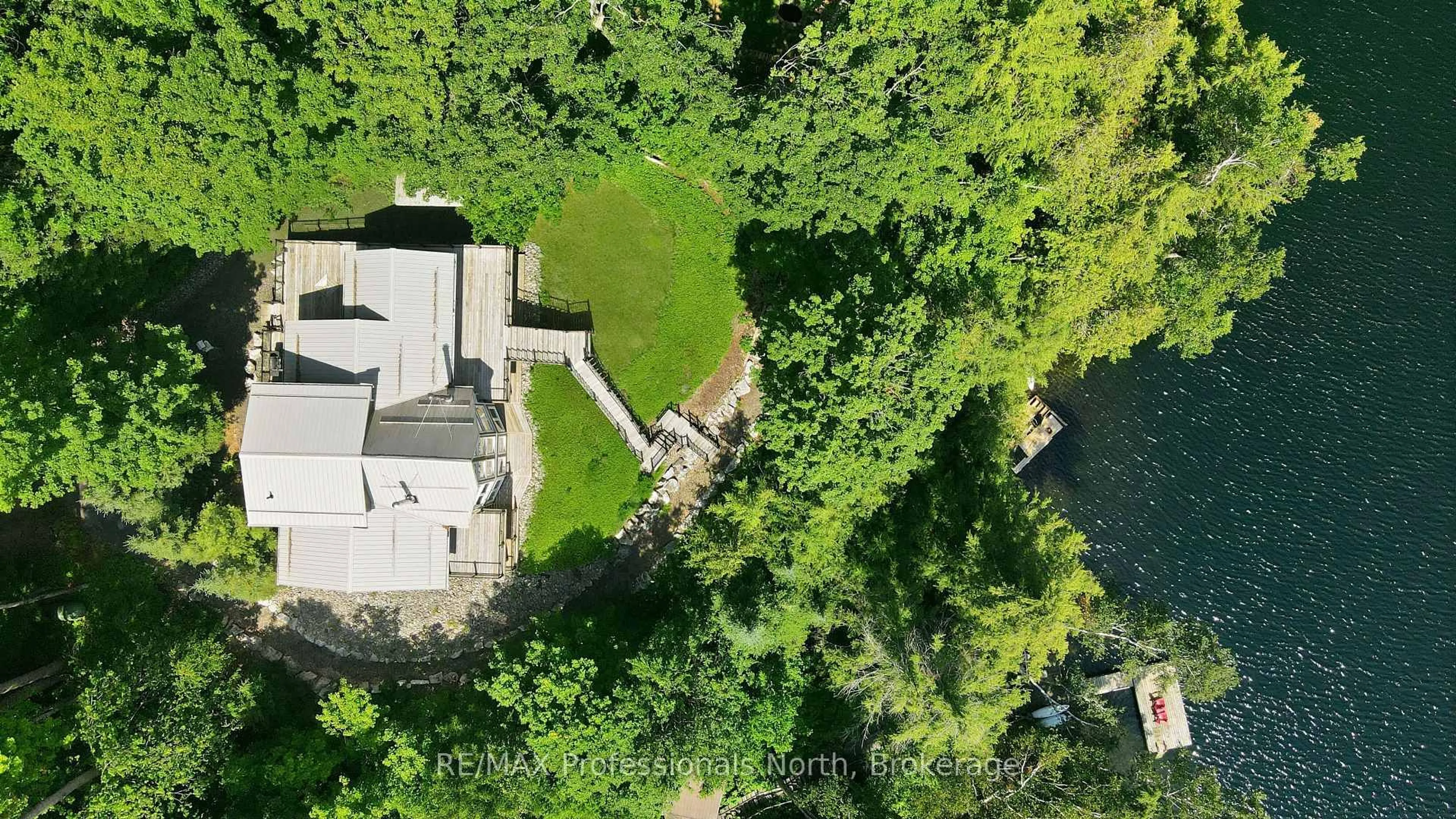 A pic from outside/outdoor area/front of a property/back of a property/a pic from drone, forest/trees view for 1114 Miskwabi Lake Rd, Dysart et al Ontario K0M 1S0