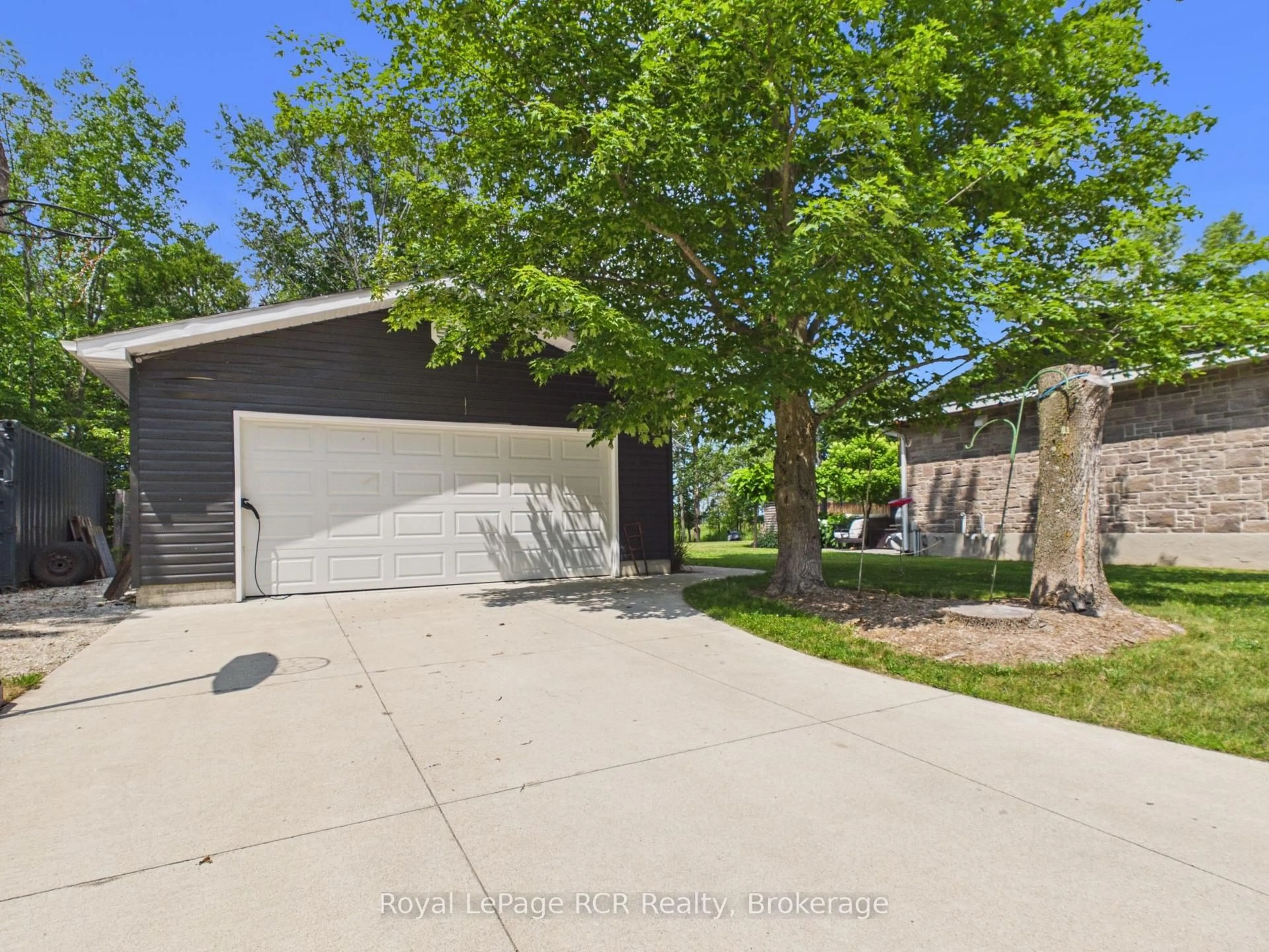 A pic from outside/outdoor area/front of a property/back of a property/a pic from drone, street for 319370 Grey Road 1 Rd, Georgian Bluffs Ontario N0H 1S0