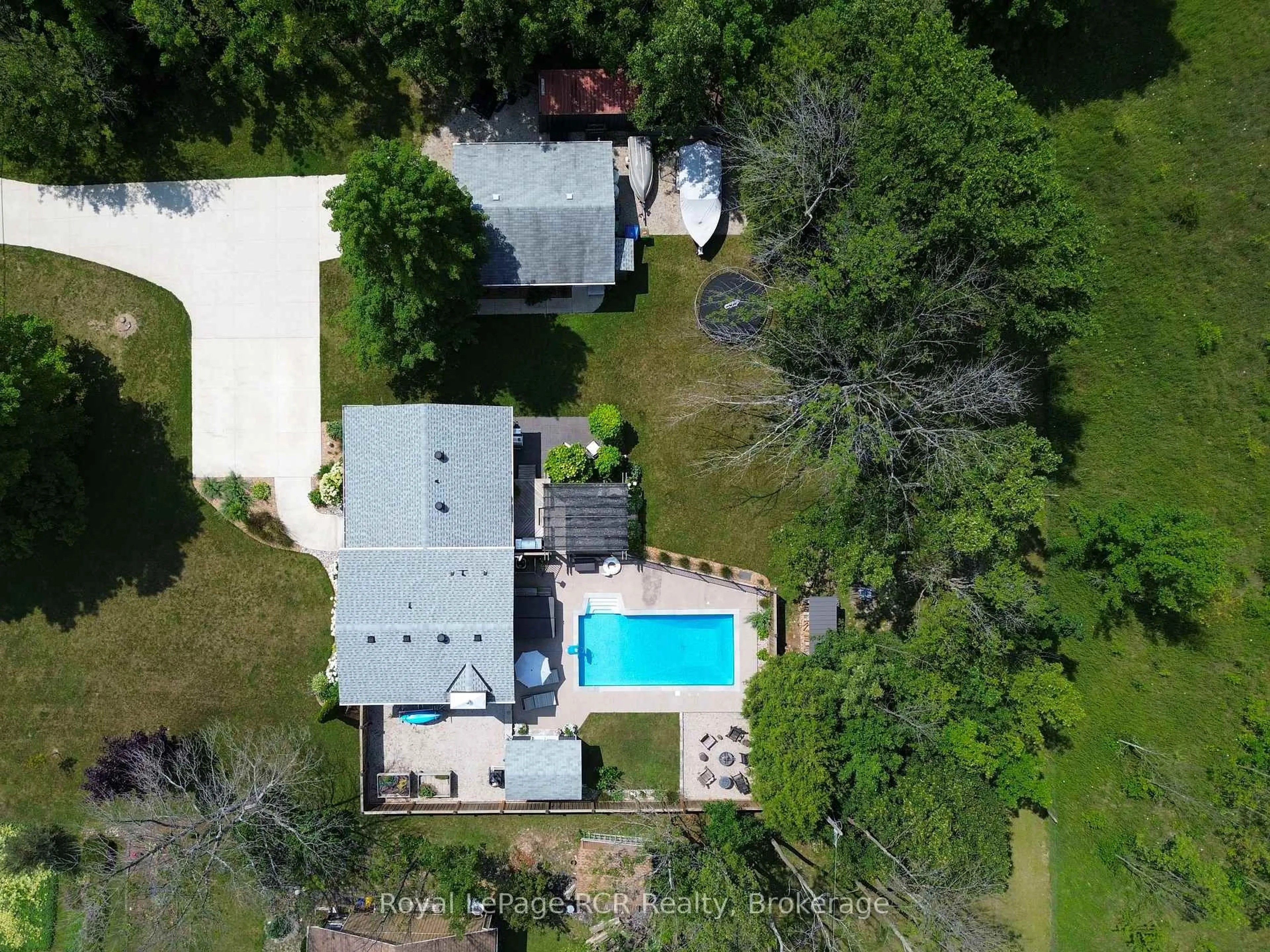 A pic from outside/outdoor area/front of a property/back of a property/a pic from drone, street for 319370 Grey Road 1 Rd, Georgian Bluffs Ontario N0H 1S0