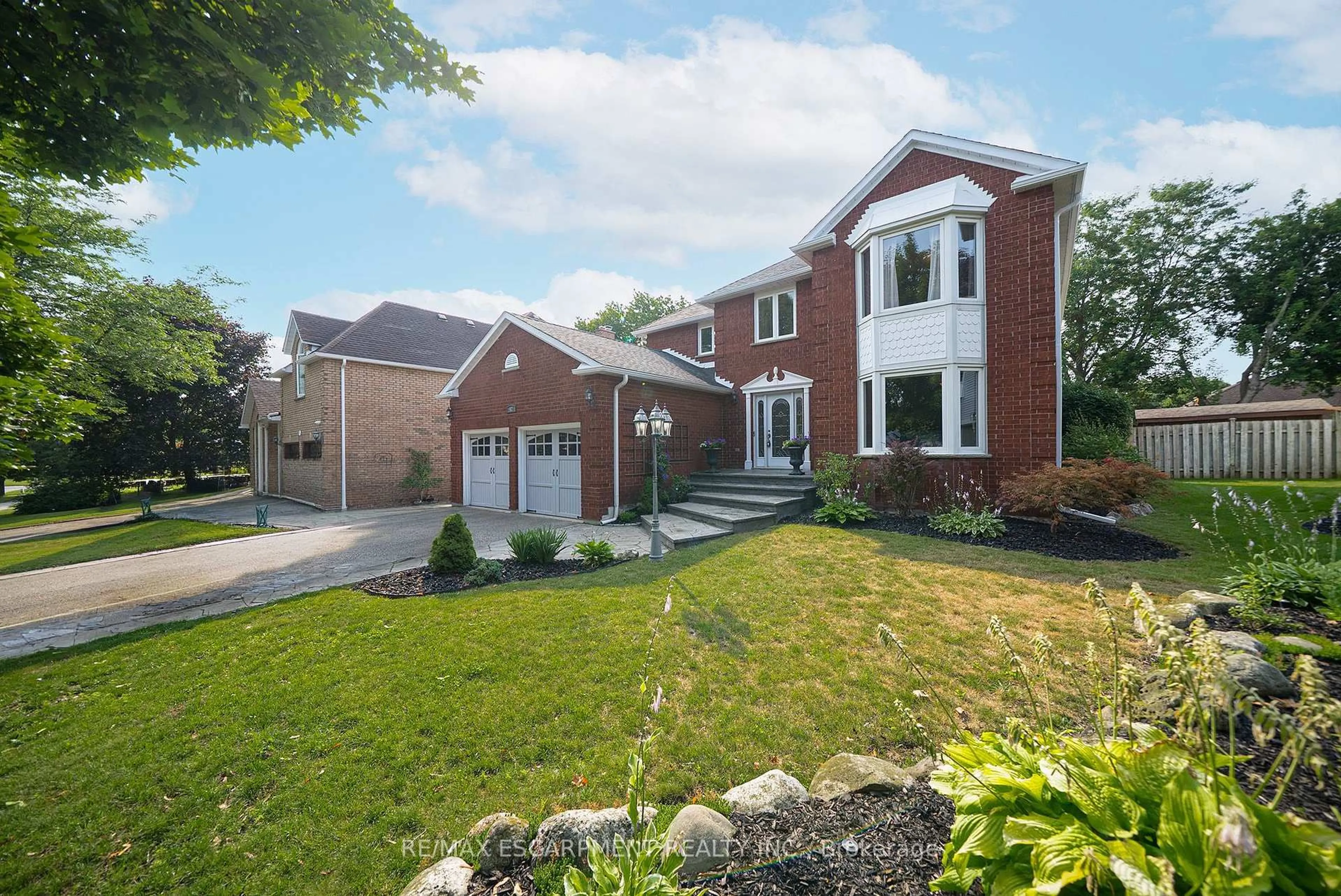 Home with brick exterior material, street for 42 Muirhead Cres, Brantford Ontario N3R 7S5