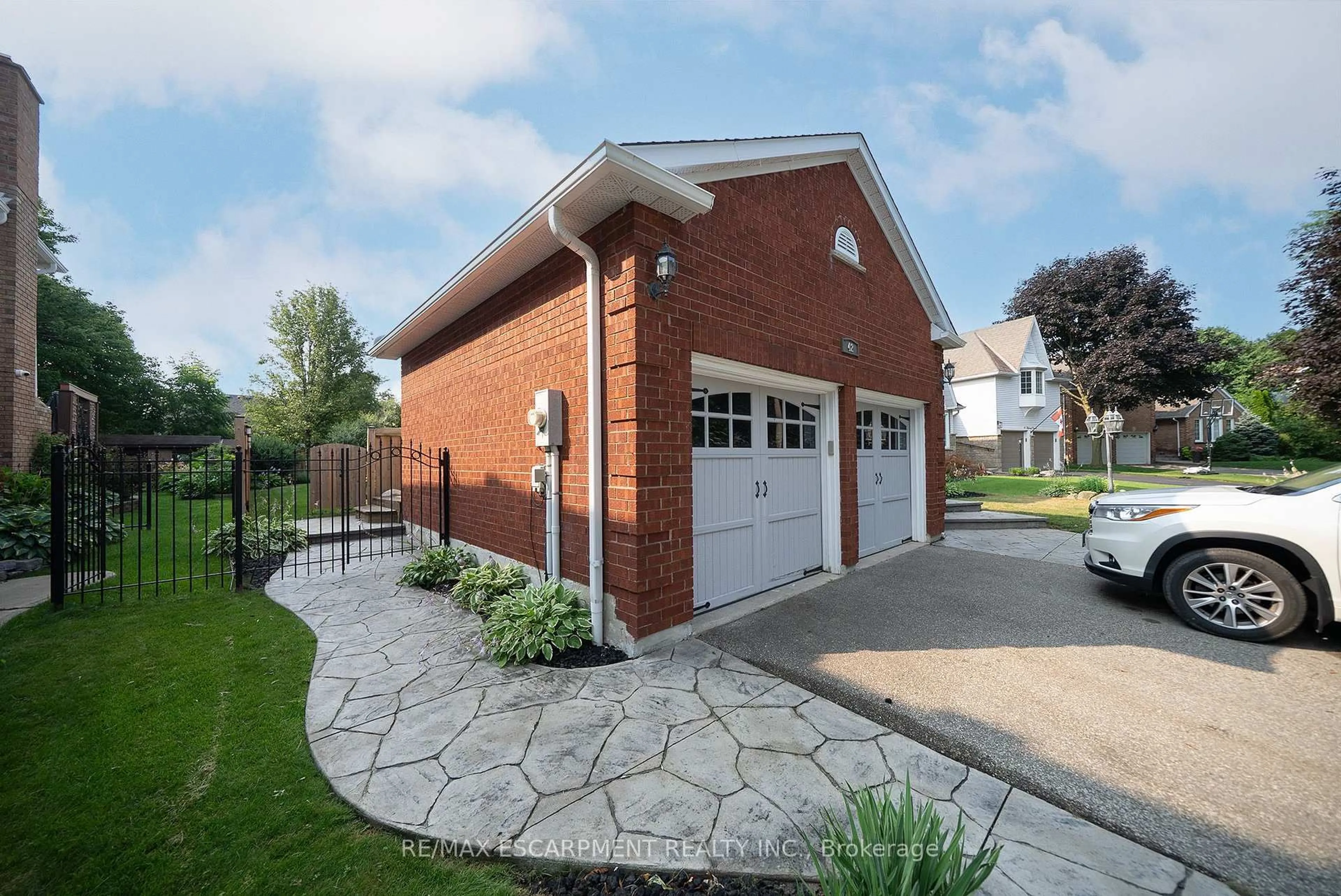 Home with brick exterior material, street for 42 Muirhead Cres, Brantford Ontario N3R 7S5