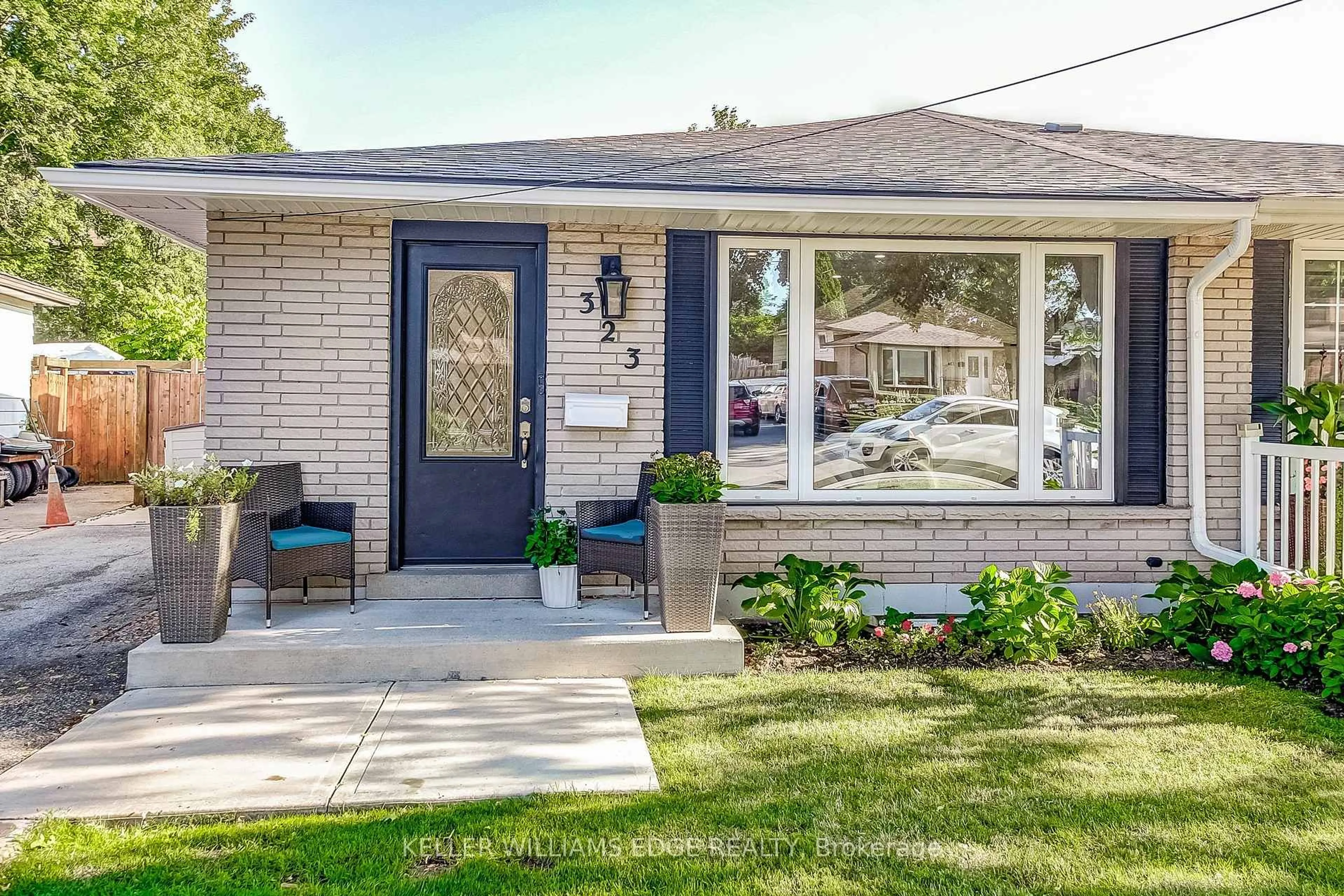 Home with brick exterior material, street for 323 Cranbrook Dr, Hamilton Ontario L9C 4T4