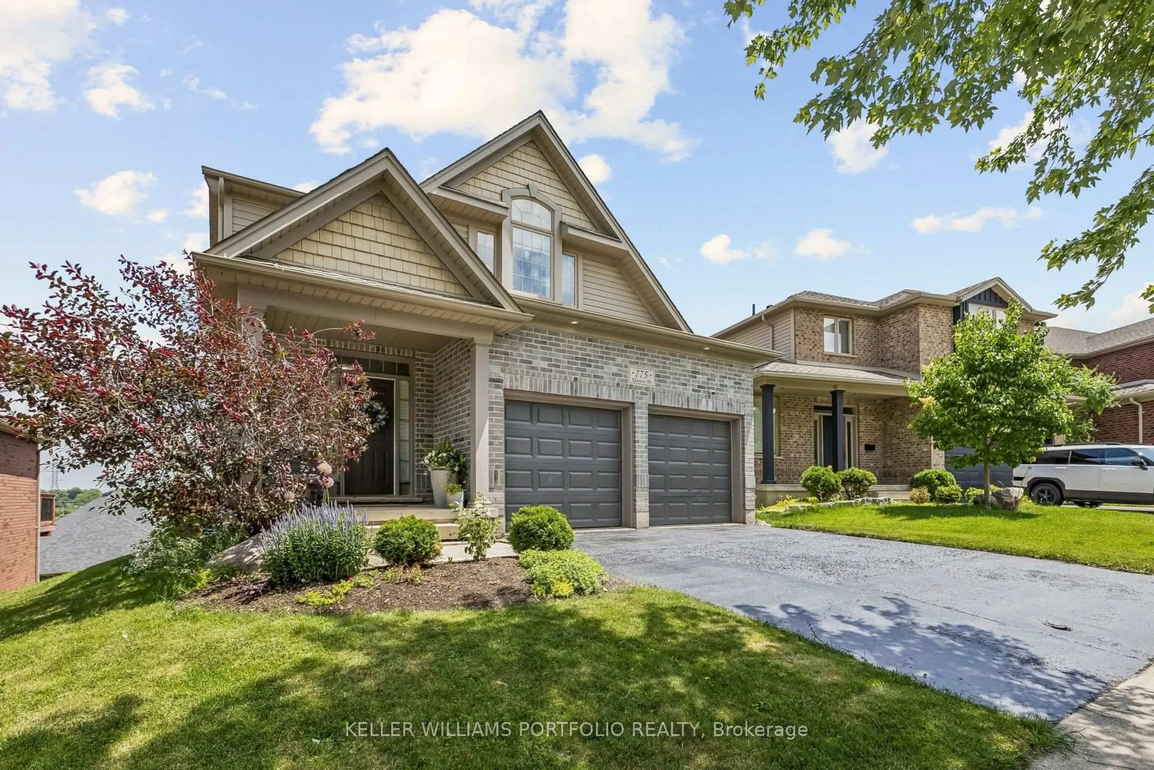 Home with brick exterior material, street for 775 Klosters Dr, Waterloo Ontario N2V 2V4