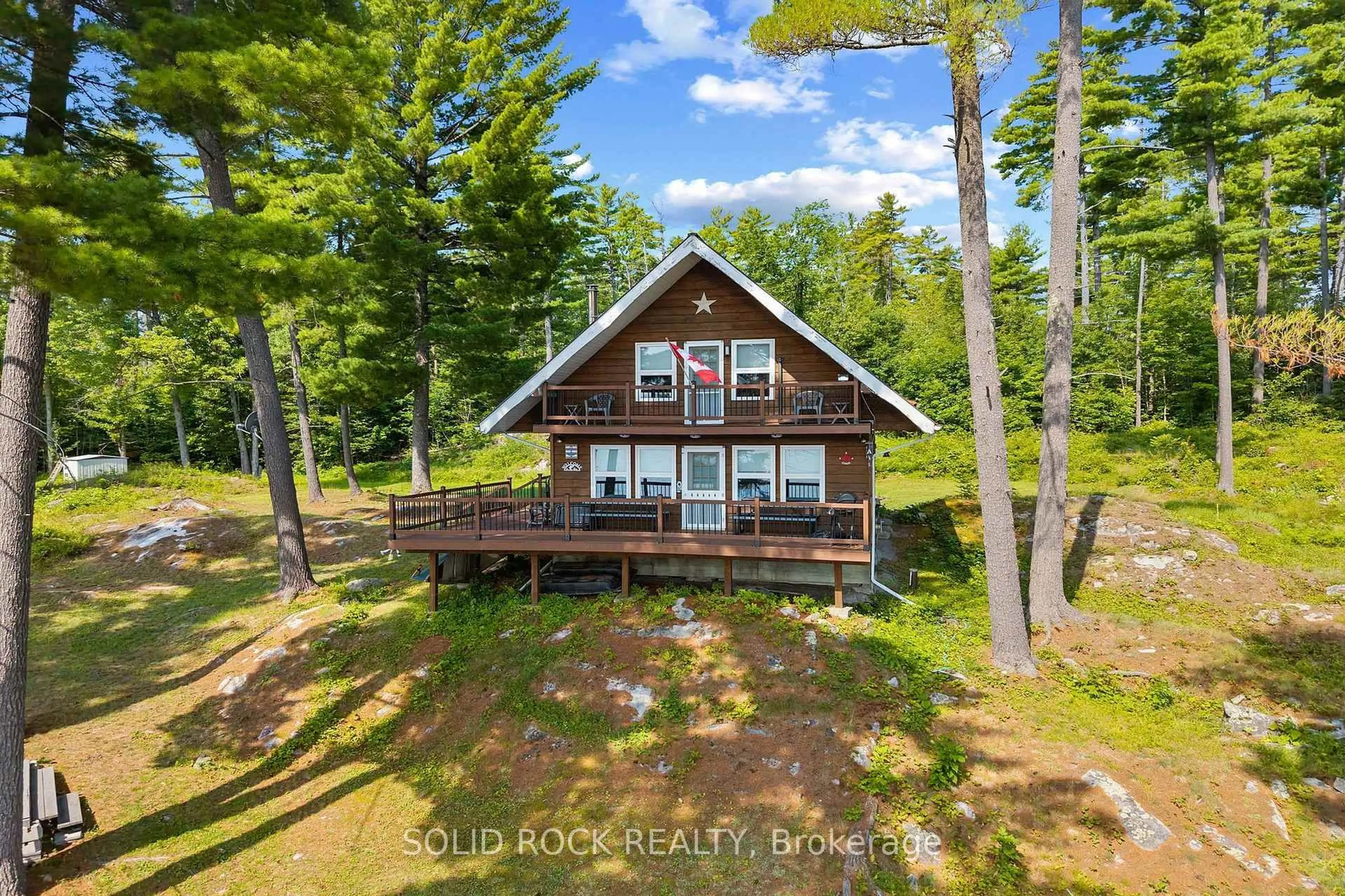 A pic from outside/outdoor area/front of a property/back of a property/a pic from drone, water/lake/river/ocean view for 992 White Lake, White Lake Ontario K0A 3L0