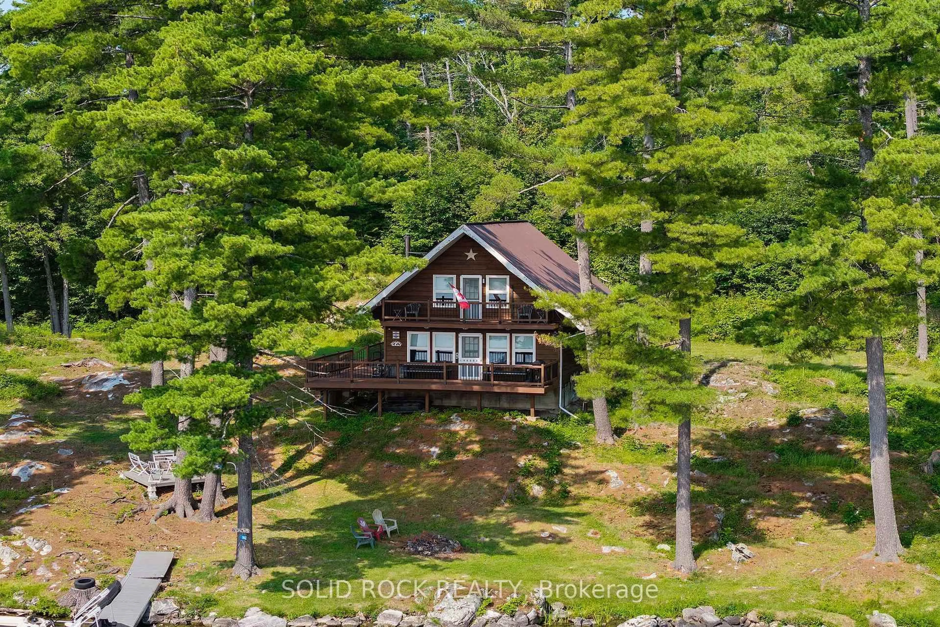 A pic from outside/outdoor area/front of a property/back of a property/a pic from drone, water/lake/river/ocean view for 992 White Lake, White Lake Ontario K0A 3L0