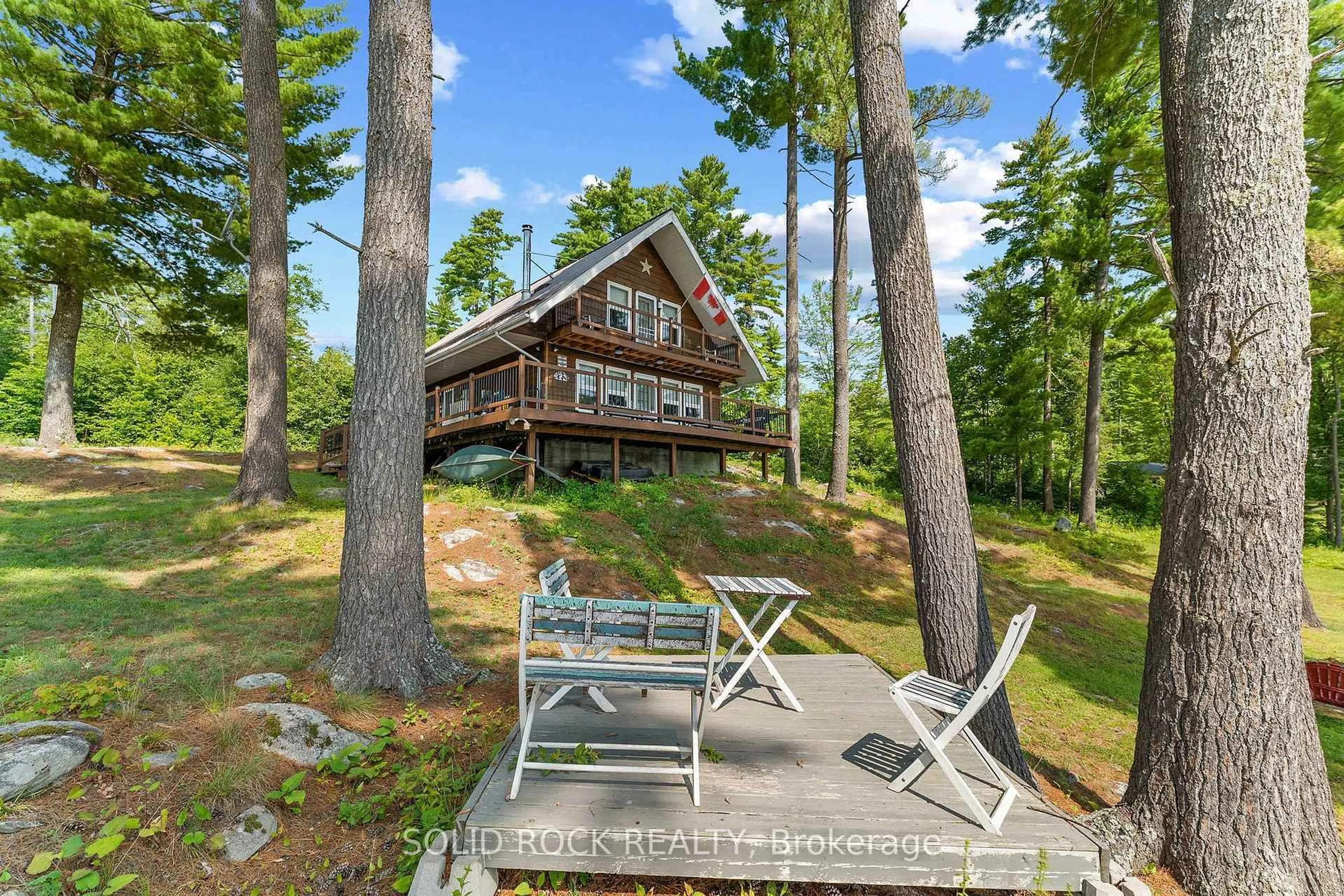 A pic from outside/outdoor area/front of a property/back of a property/a pic from drone, water/lake/river/ocean view for 992 White Lake, White Lake Ontario K0A 3L0