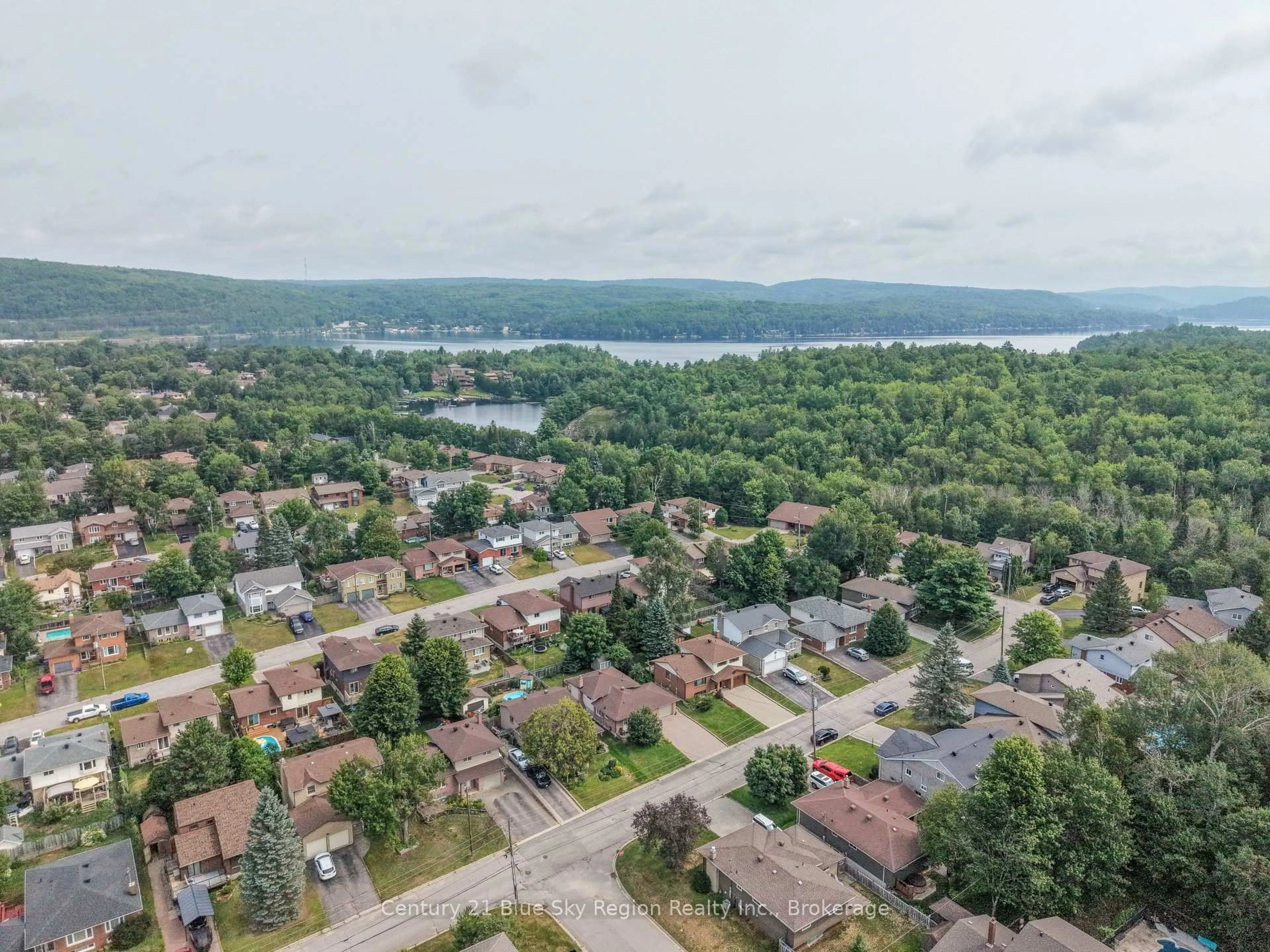 A pic from outside/outdoor area/front of a property/back of a property/a pic from drone, water/lake/river/ocean view for 113 Sable Cres, North Bay Ontario P1A 3X6