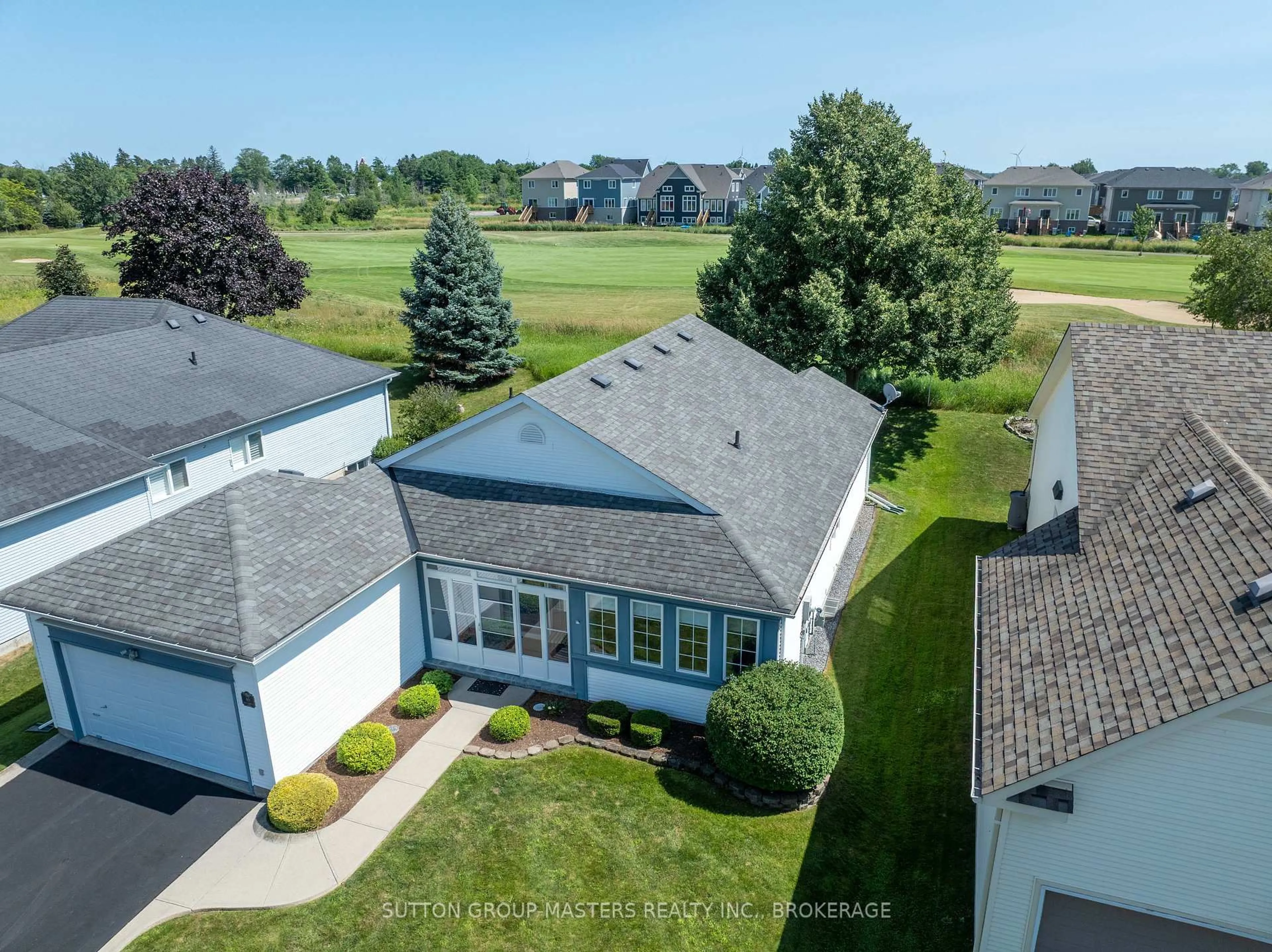 A pic from outside/outdoor area/front of a property/back of a property/a pic from drone, water/lake/river/ocean view for 80 Abbey Dawn Dr #Country Cl, Bath Ontario K0H 1G0