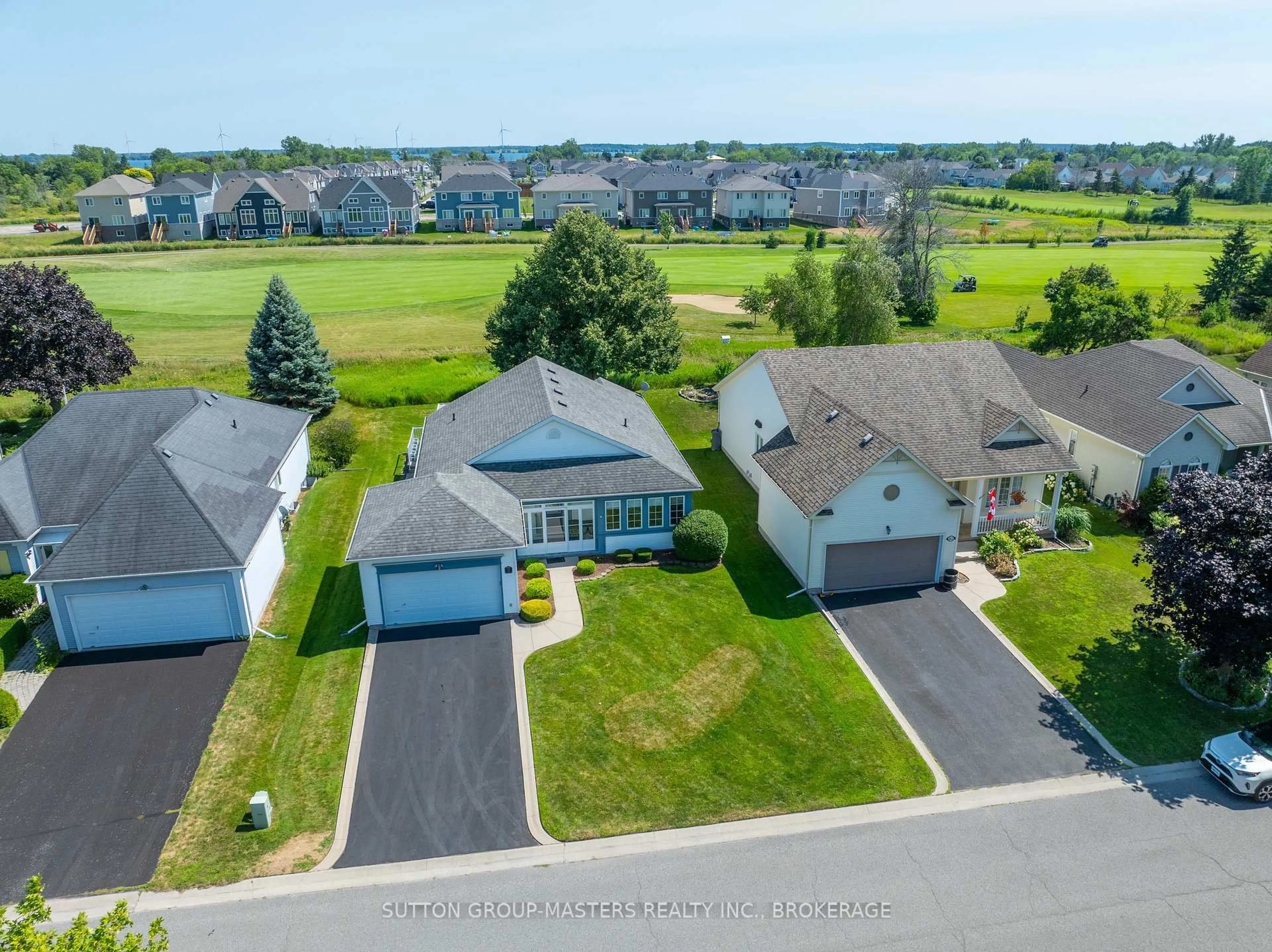 A pic from outside/outdoor area/front of a property/back of a property/a pic from drone, water/lake/river/ocean view for 80 Abbey Dawn Dr #Country Cl, Bath Ontario K0H 1G0