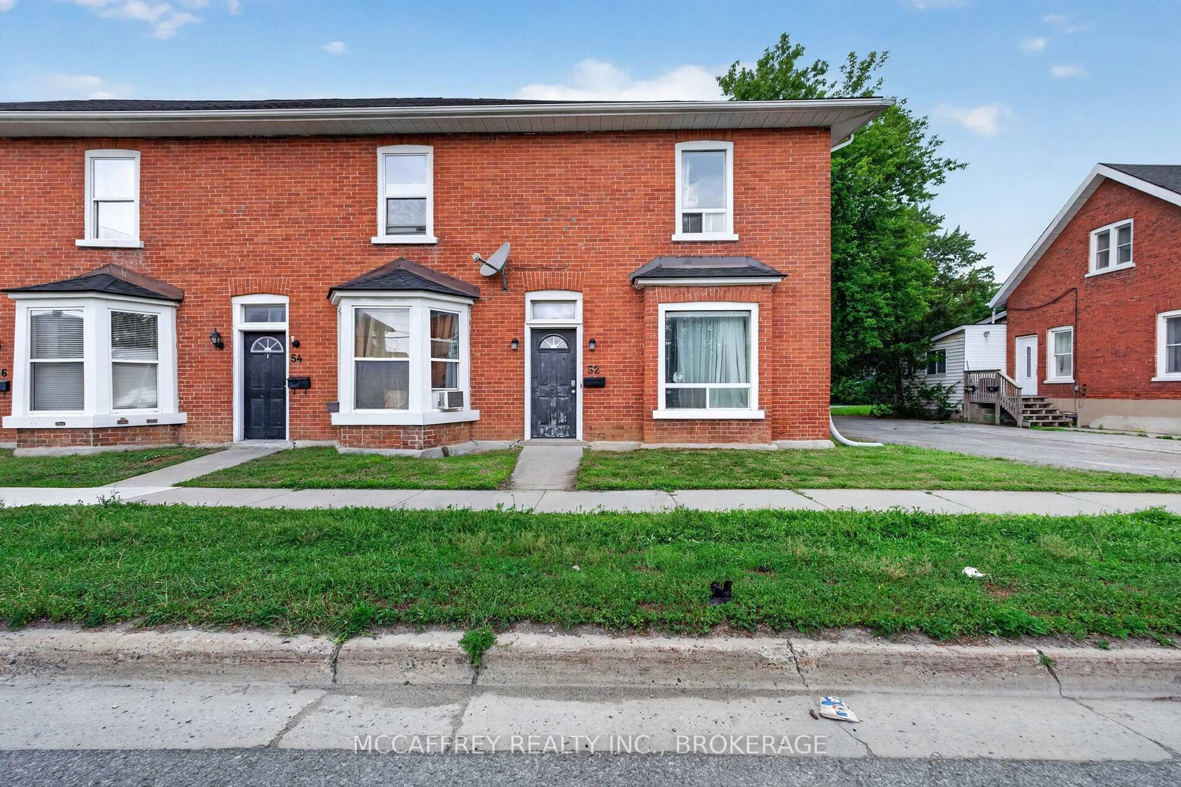 Home with brick exterior material, street for 52 Moira St, Belleville Ontario K8P 1S3