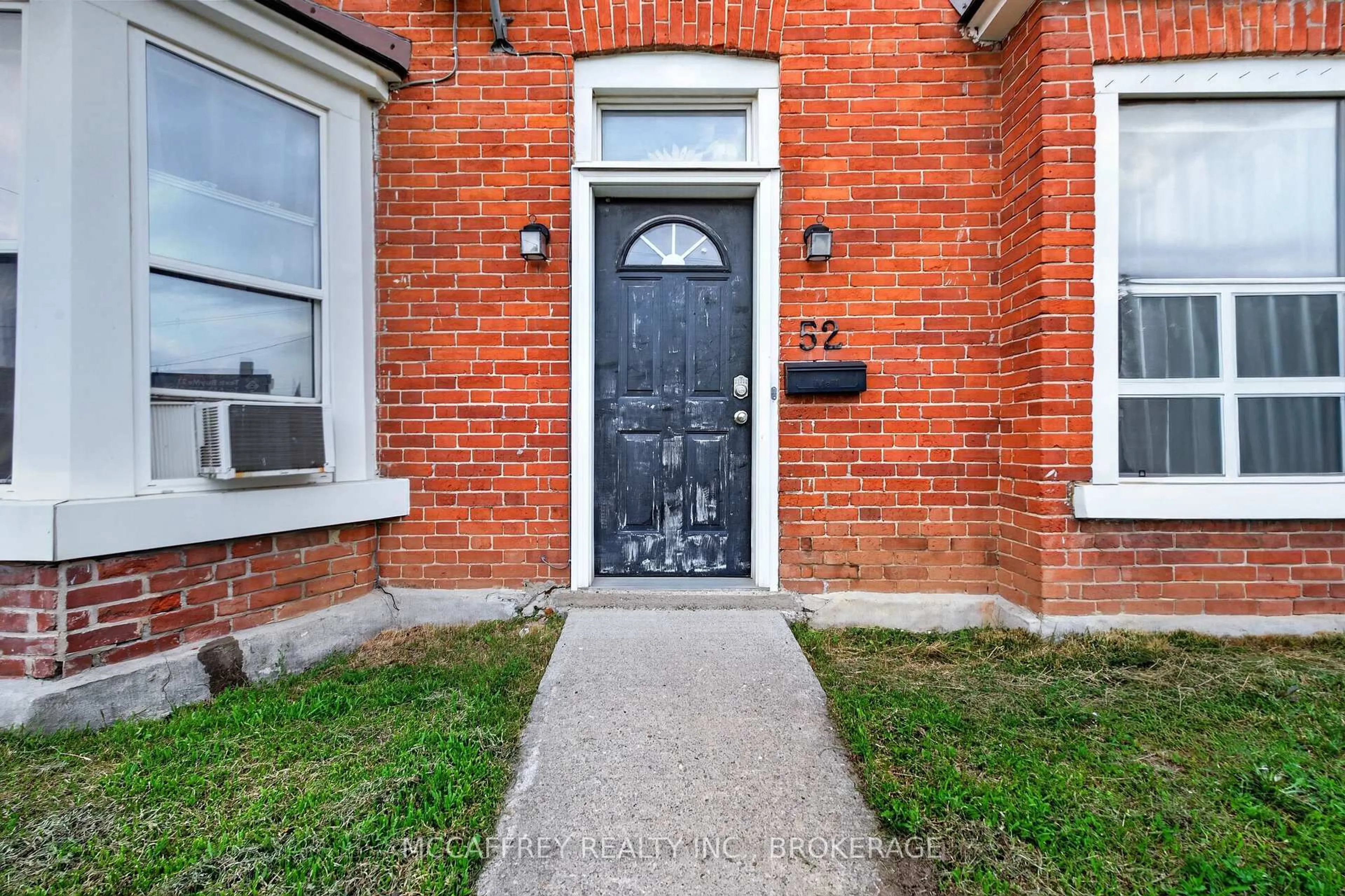 Home with brick exterior material, street for 52 Moira St, Belleville Ontario K8P 1S3
