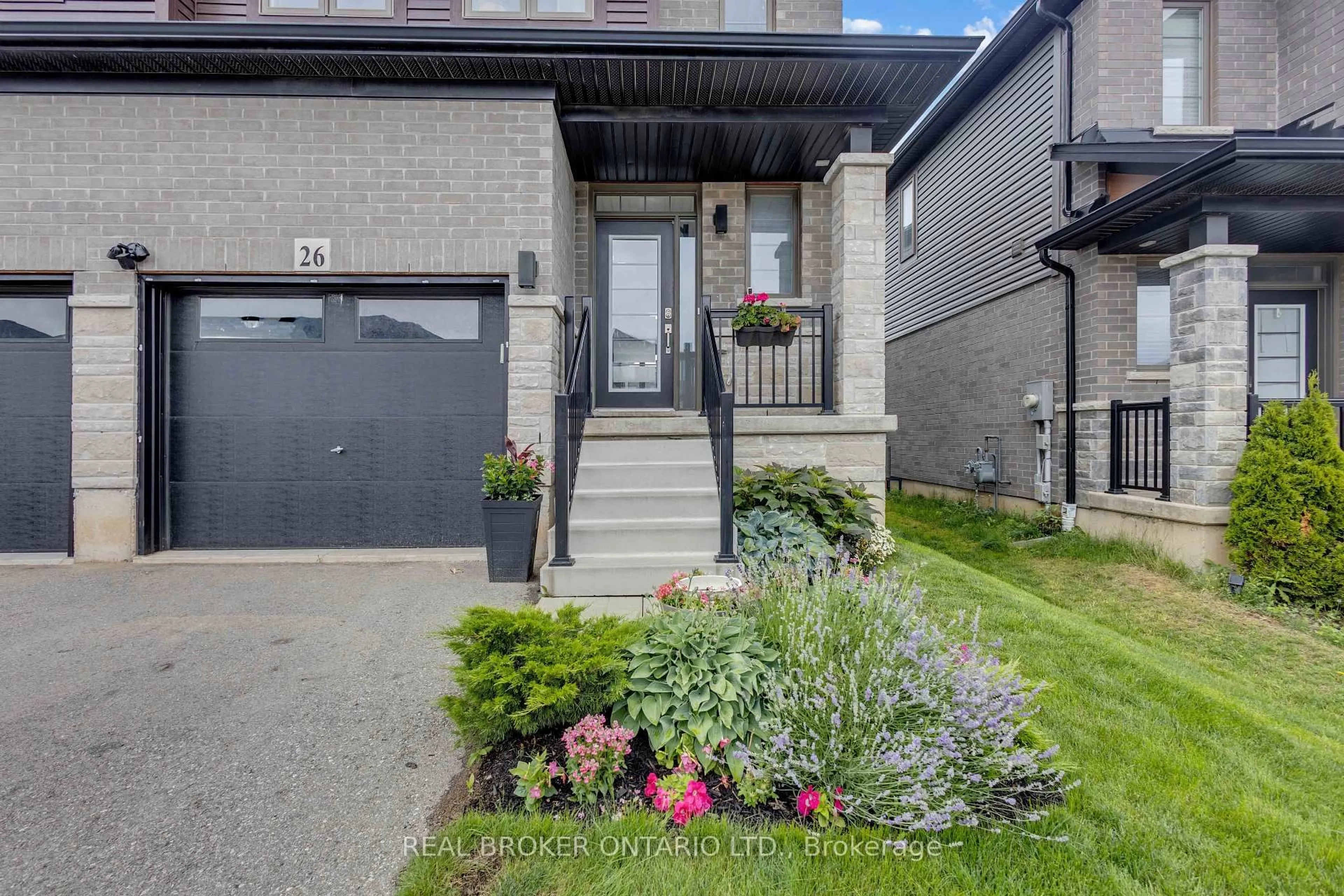 Home with brick exterior material, street for 26 Baker Lane, Brant Ontario N3L 0J7