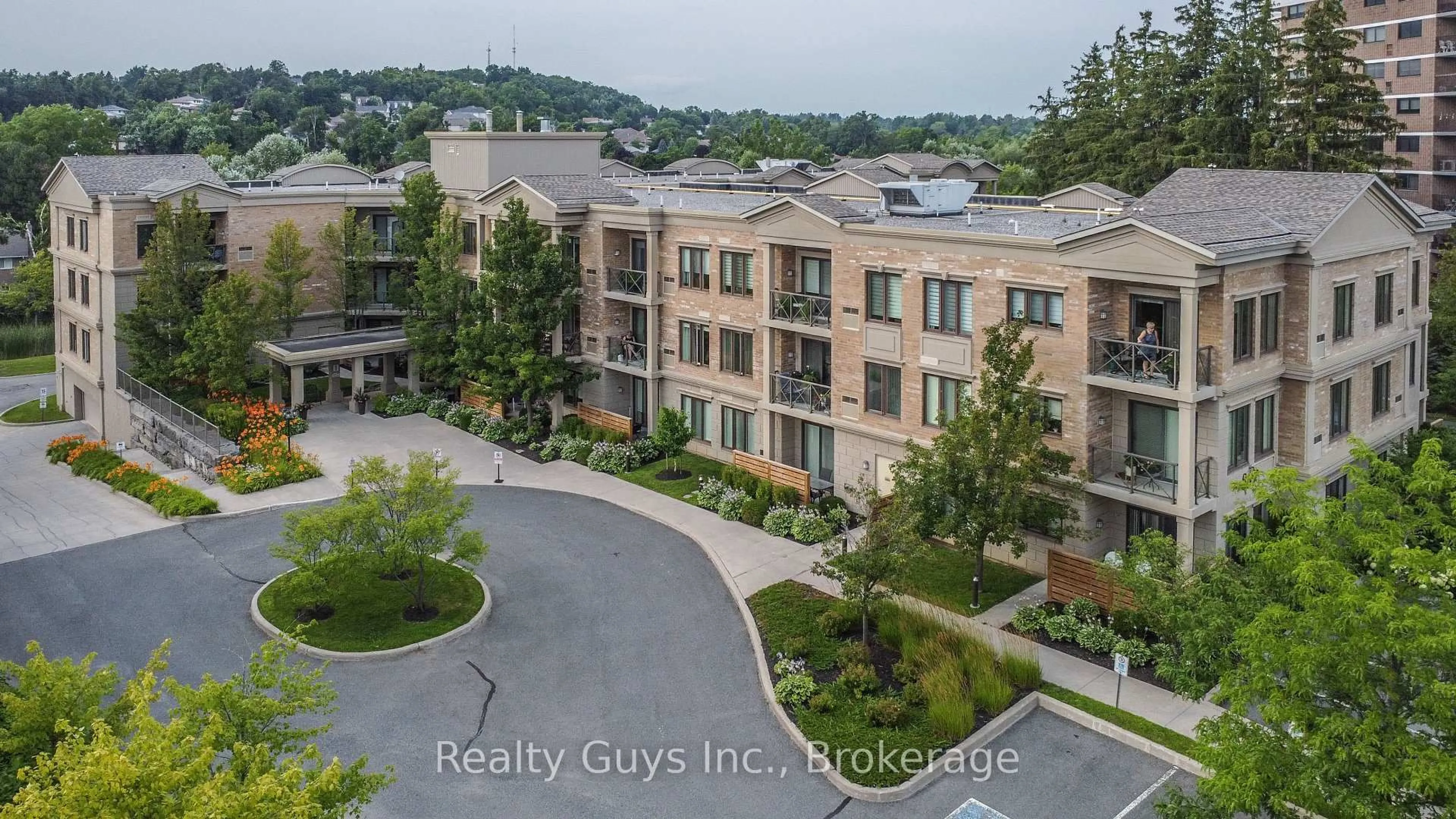 A pic from outside/outdoor area/front of a property/back of a property/a pic from drone, water/lake/river/ocean view for 869 Clonsilla Ave #116, Peterborough Ontario K9J 0B7