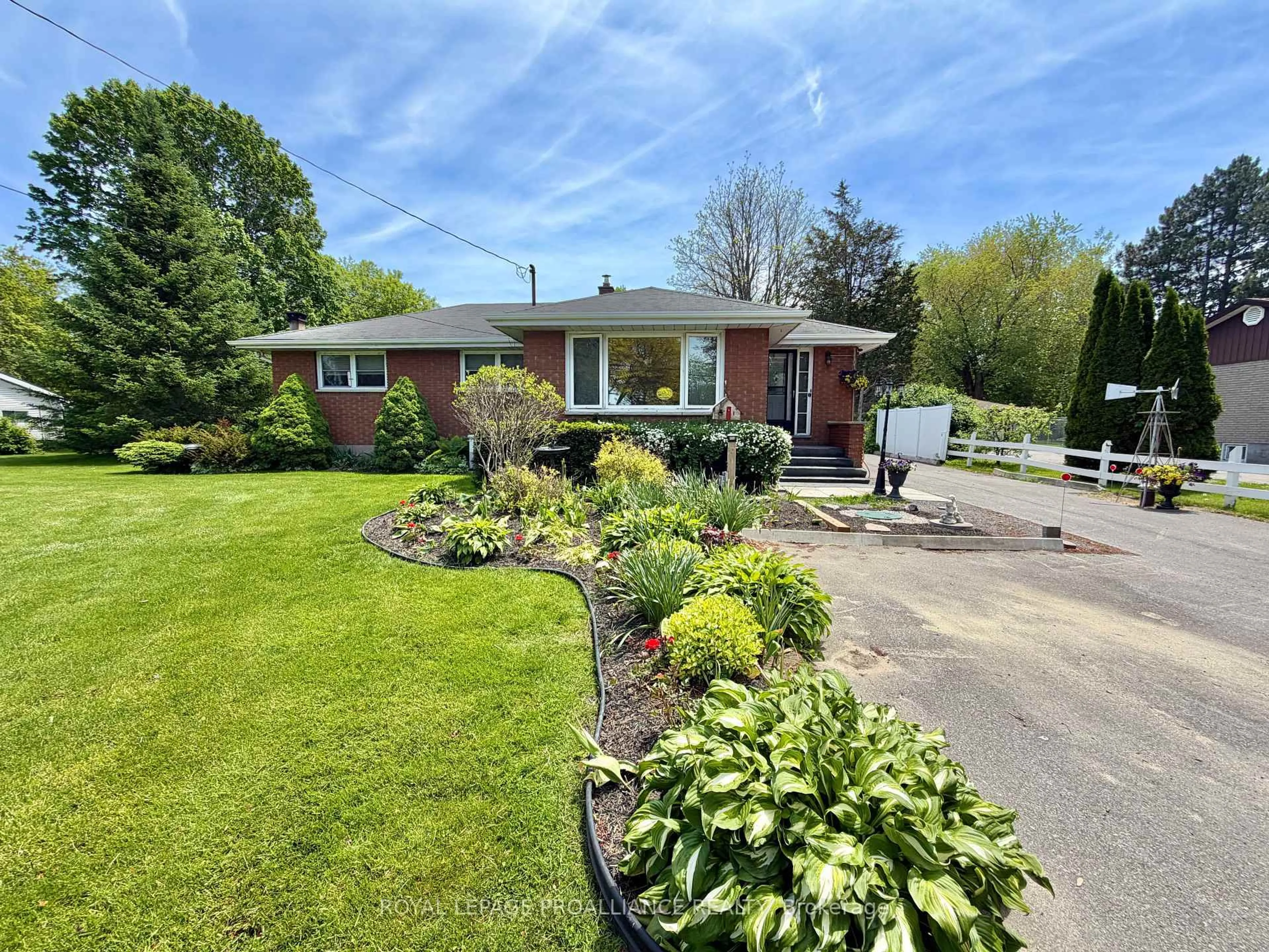 A pic from outside/outdoor area/front of a property/back of a property/a pic from drone, street for 471 County Road 3 Rd, Prince Edward County Ontario K8N 4Z1