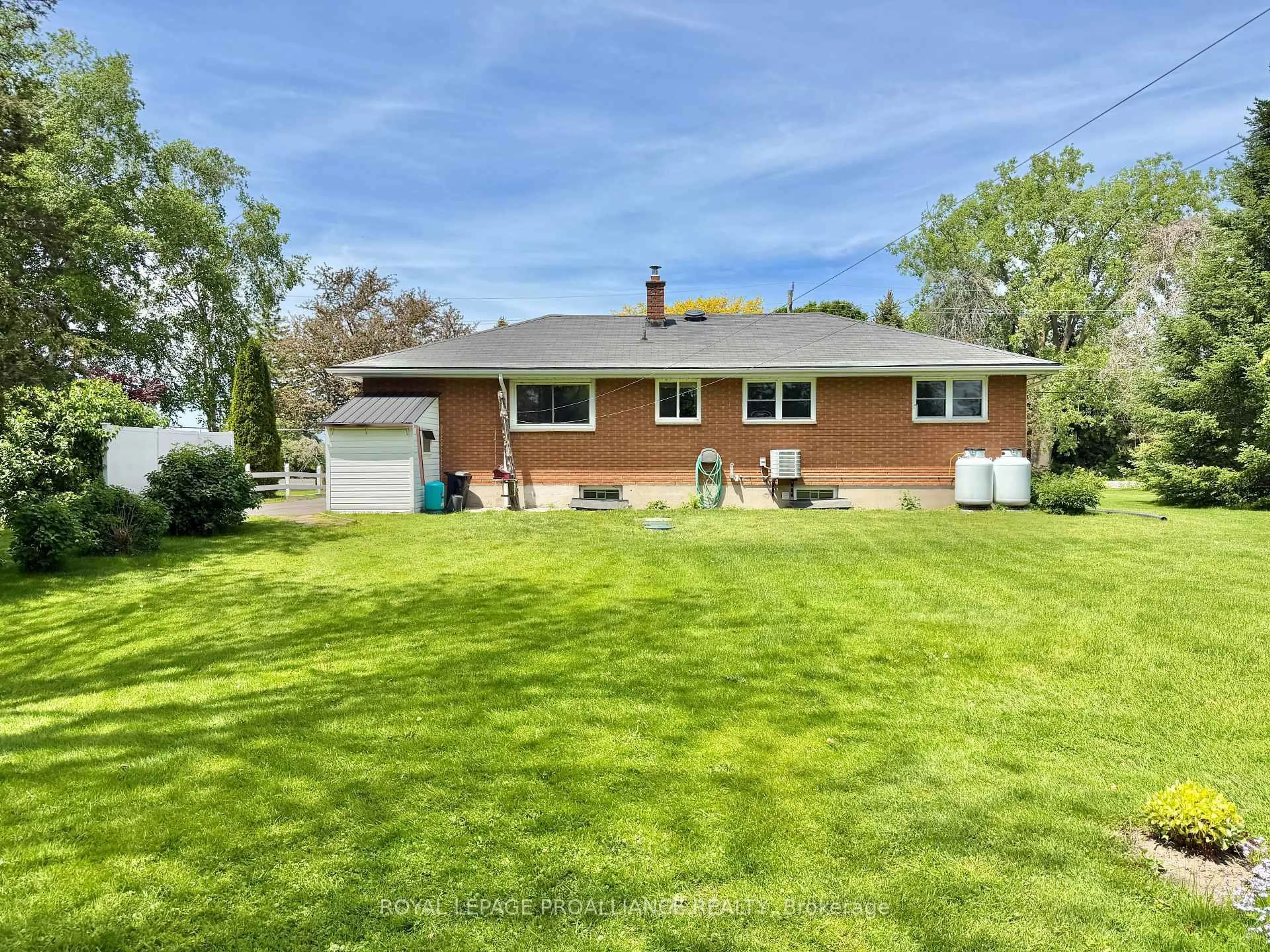 A pic from outside/outdoor area/front of a property/back of a property/a pic from drone, street for 471 County Road 3 Rd, Prince Edward County Ontario K8N 4Z1