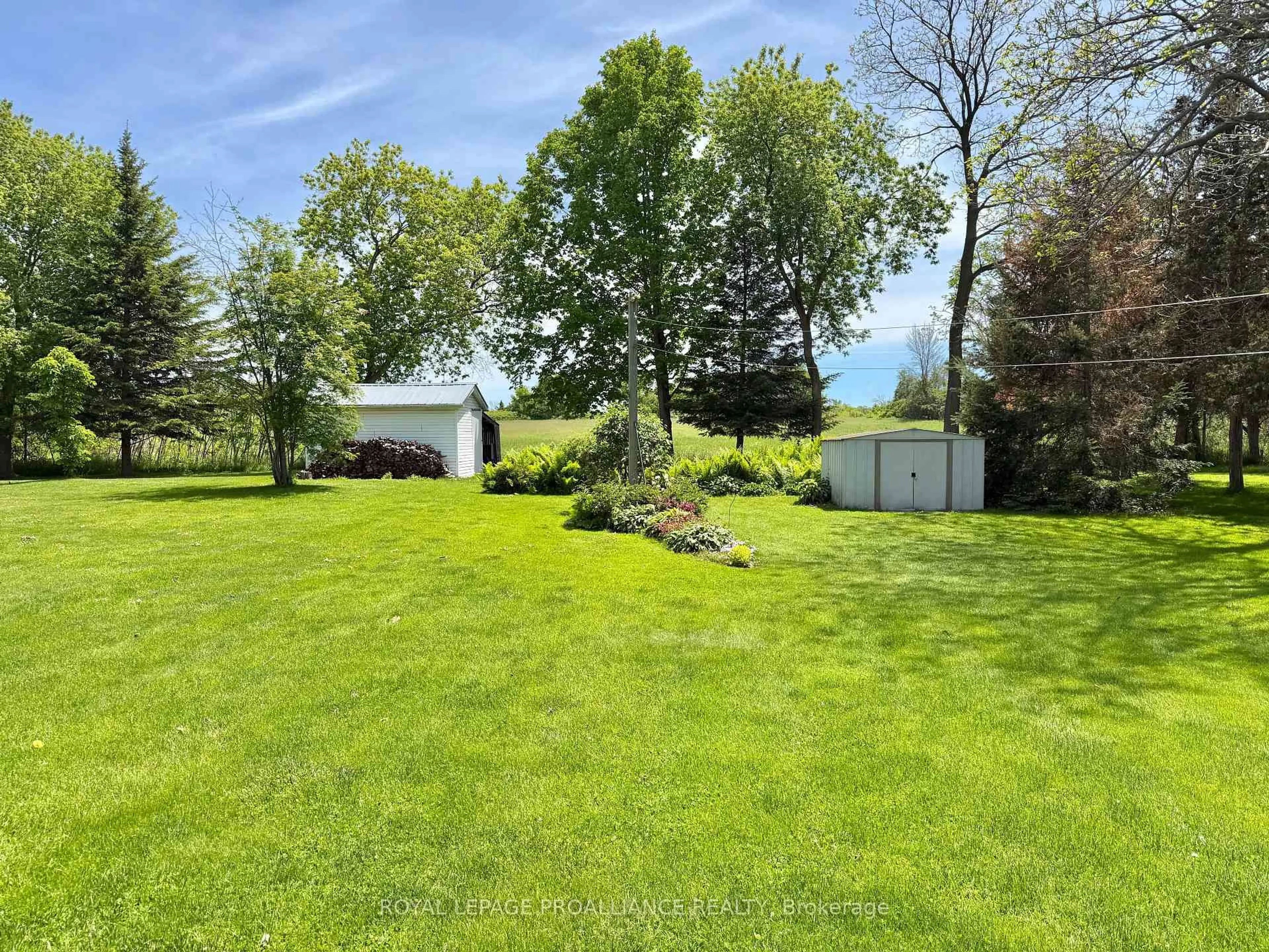 A pic from outside/outdoor area/front of a property/back of a property/a pic from drone, water/lake/river/ocean view for 471 County Road 3 Rd, Prince Edward County Ontario K8N 4Z1