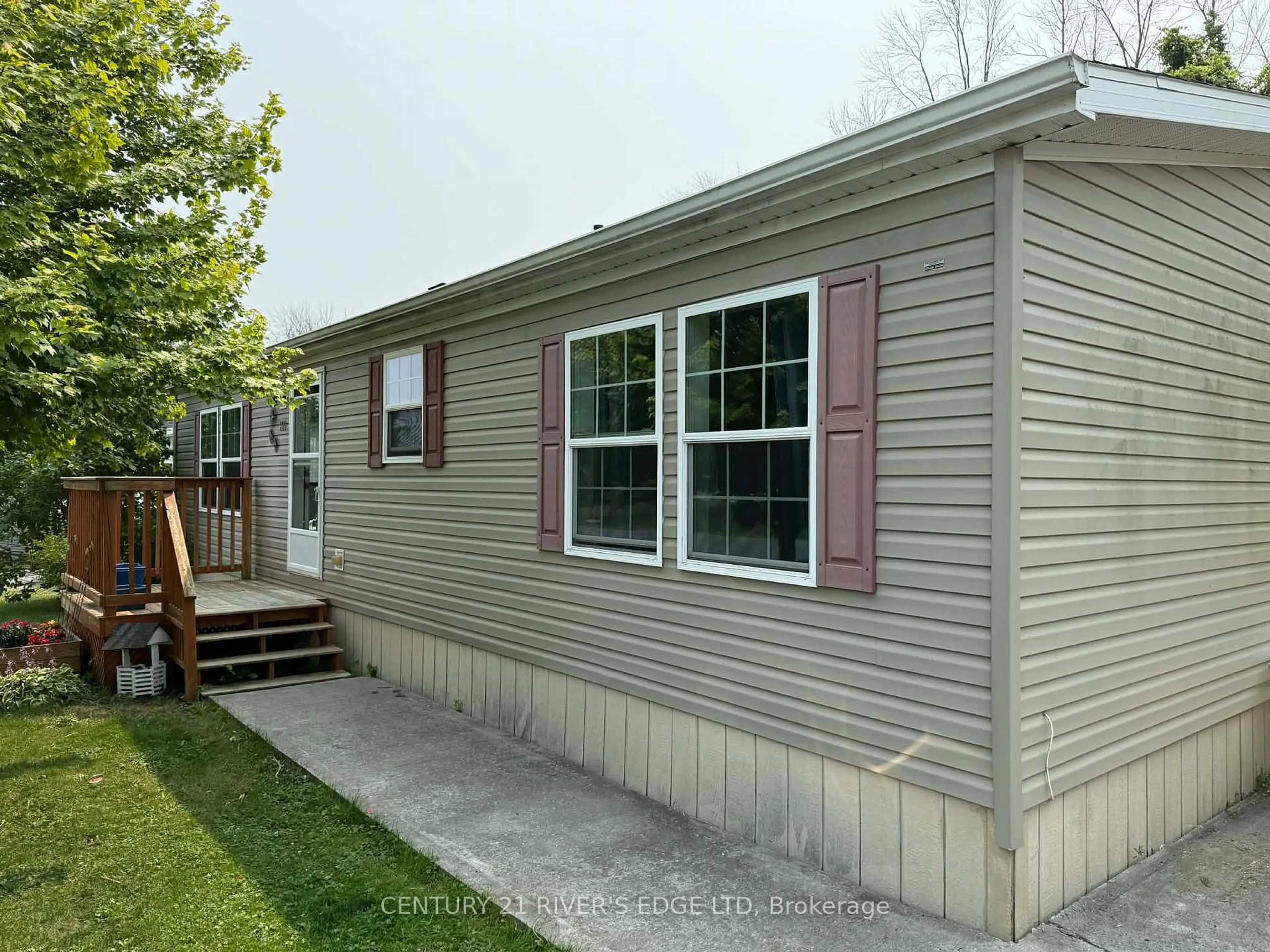 Home with vinyl exterior material, street for 63 Whites Rd, Quinte West Ontario K8V 5P5