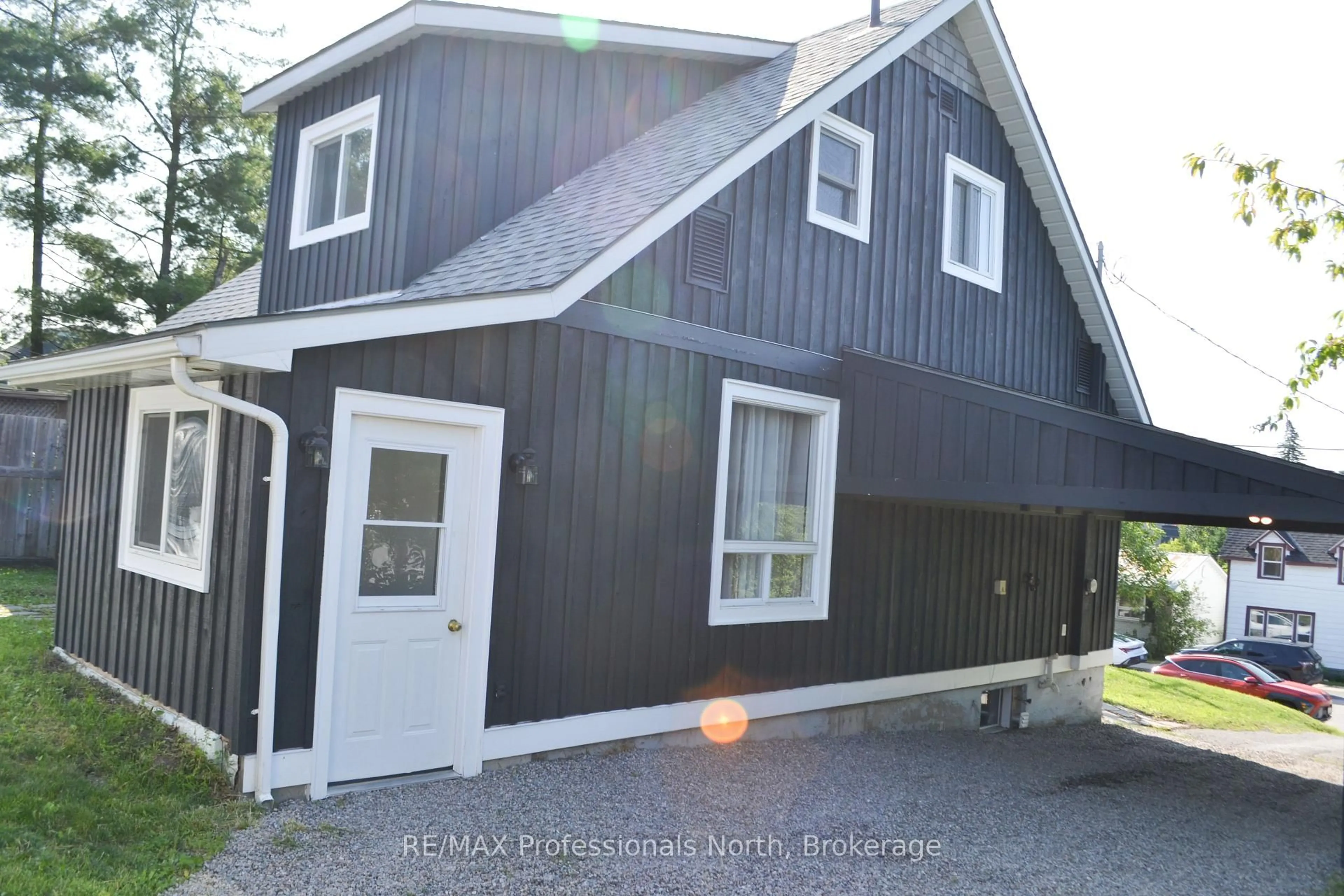 Home with vinyl exterior material, street for 14 Princess St, Huntsville Ontario P1H 1P2