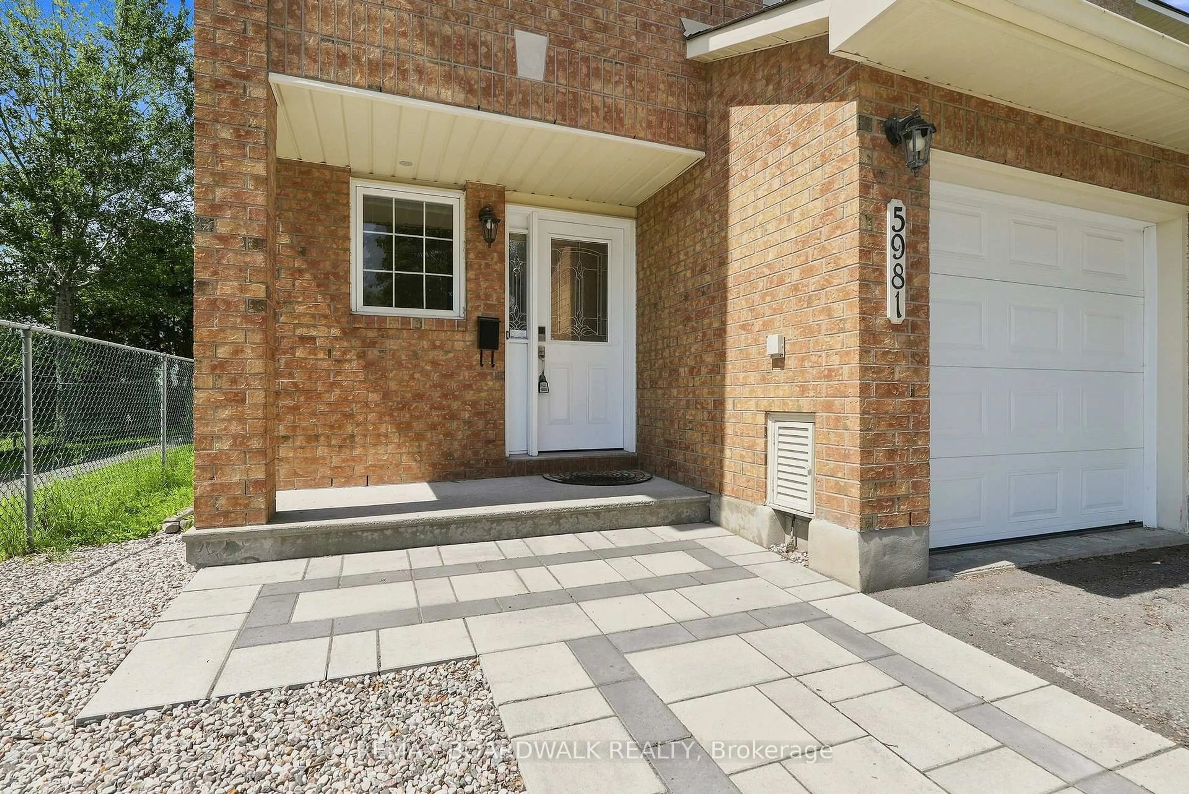Home with brick exterior material, street for 5981 Pineglade Cres, Ottawa Ontario K1W 1G7