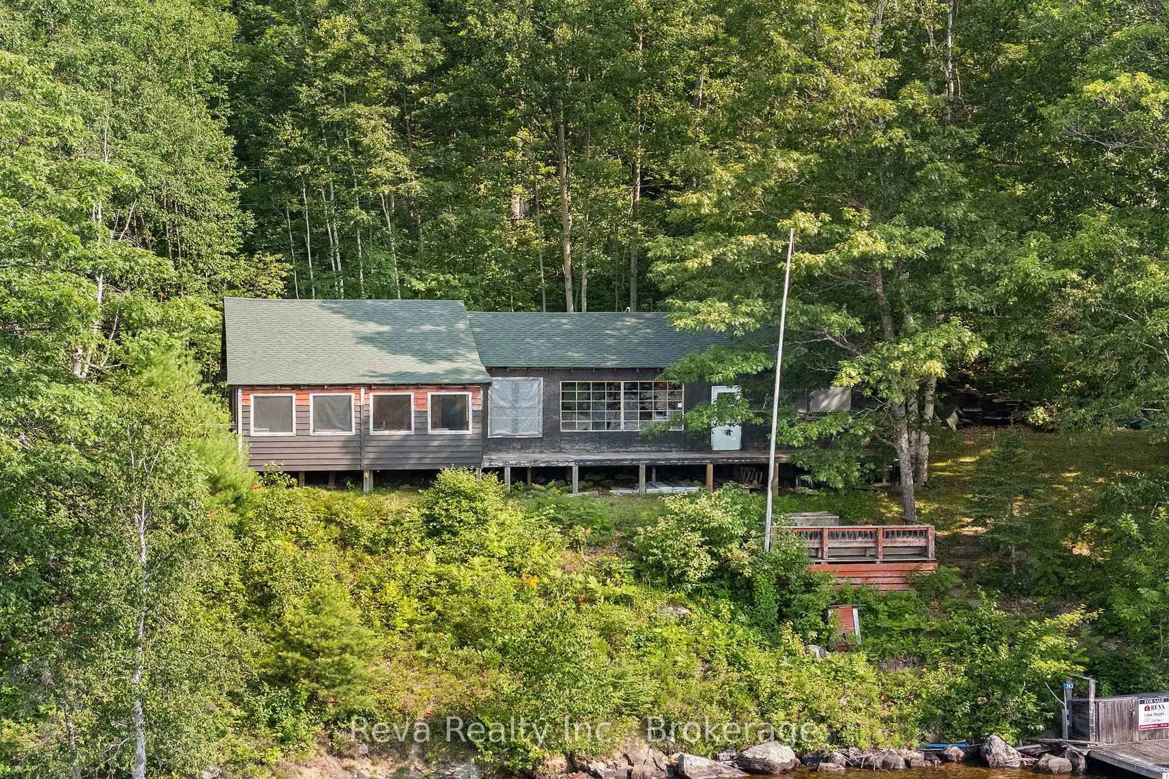 A pic from outside/outdoor area/front of a property/back of a property/a pic from drone, water/lake/river/ocean view for 743 Baptiste Lake North Shore, Bancroft Ontario K0L 1C0