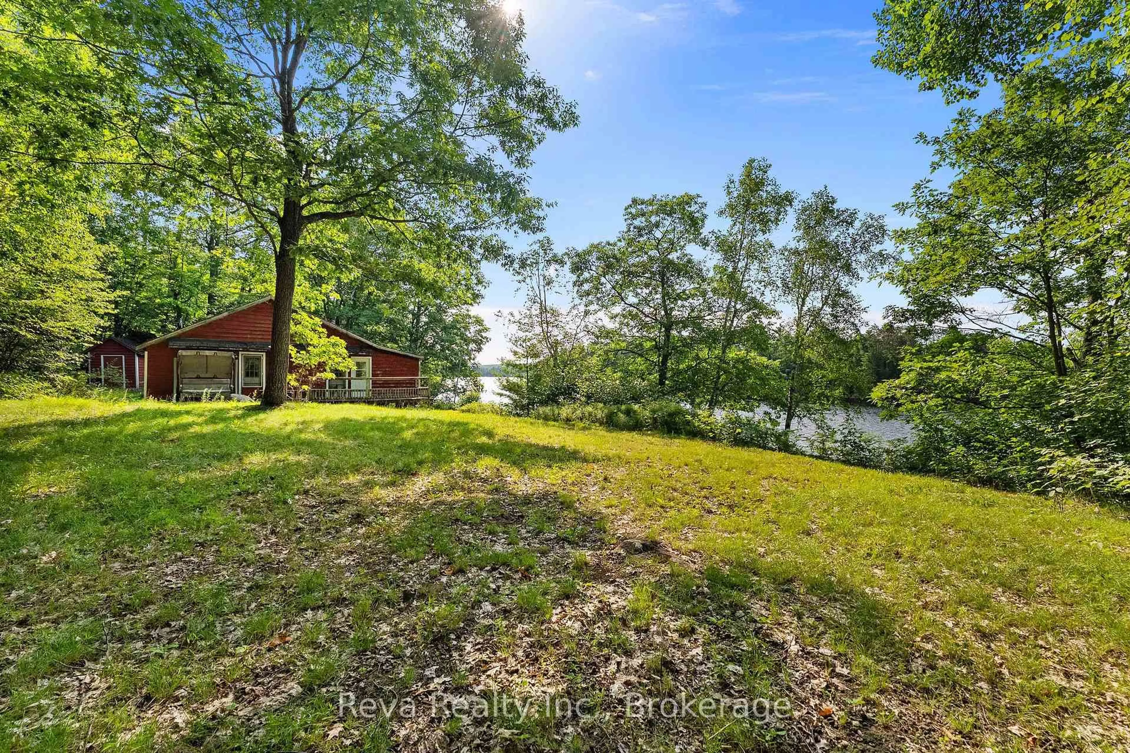 A pic from outside/outdoor area/front of a property/back of a property/a pic from drone, water/lake/river/ocean view for 743 Baptiste Lake North Shore, Bancroft Ontario K0L 1C0
